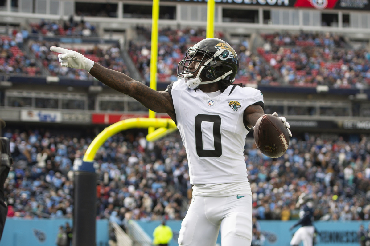 Jan 7, 2024; Nashville, Tennessee, USA; Jacksonville Jaguars wide receiver Calvin Ridley (0) reacts after scoring a touchdown against the Tennessee Titans during the first half at Nissan Stadium.  