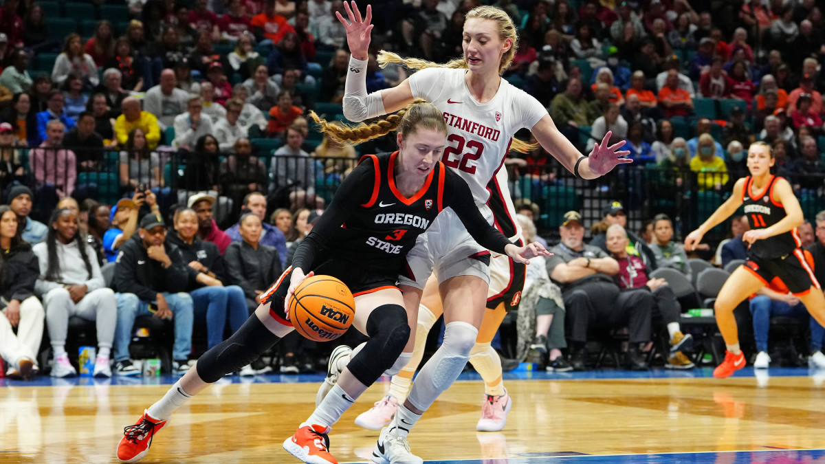 Oregon State Beavers guard Dominika Paurova dribbles against Stanford Cardinal forward Cameron Brink.