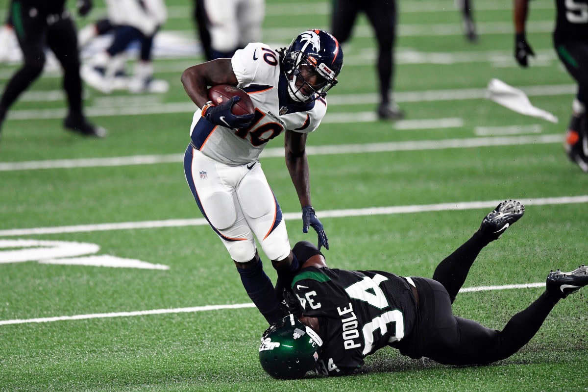 New York Jets cornerback Brian Poole (34) tackles Denver Broncos wide receiver Jerry Jeudy (10) in the second half. The Jets lose to the Broncos, 37-28, at MetLife Stadium on Thursday, Oct. 1, 2020, in East Rutherford. Nfl Jets Broncos