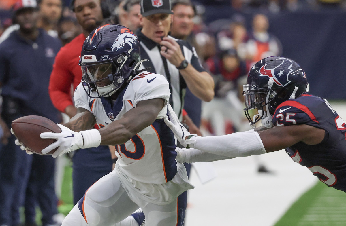 Dec 3, 2023; Houston, Texas, USA;Denver Broncos wide receiver Jerry Jeudy (10) catches the ball against Houston Texans cornerback Desmond King II (25) in the second half at NRG Stadium. Mandatory Credit: Thomas Shea-USA TODAY Sports  