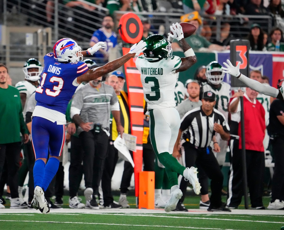 New York Jets safety Jordan Whitehead (3) intercepts a pass intended for Buffalo Bills wide receiver Gabe Davis (13). Mandatory Credit: Robert Deutsch-USA TODAY Sports