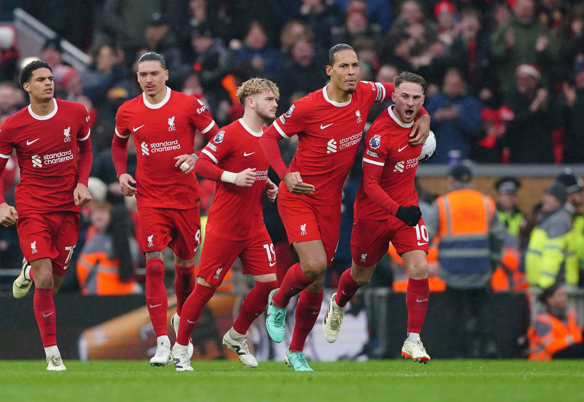 Alexis Mac Allister pictured (right) celebrating with his Liverpool teammates after scoring a goal in a 1-1 draw against Manchester City in March 2024