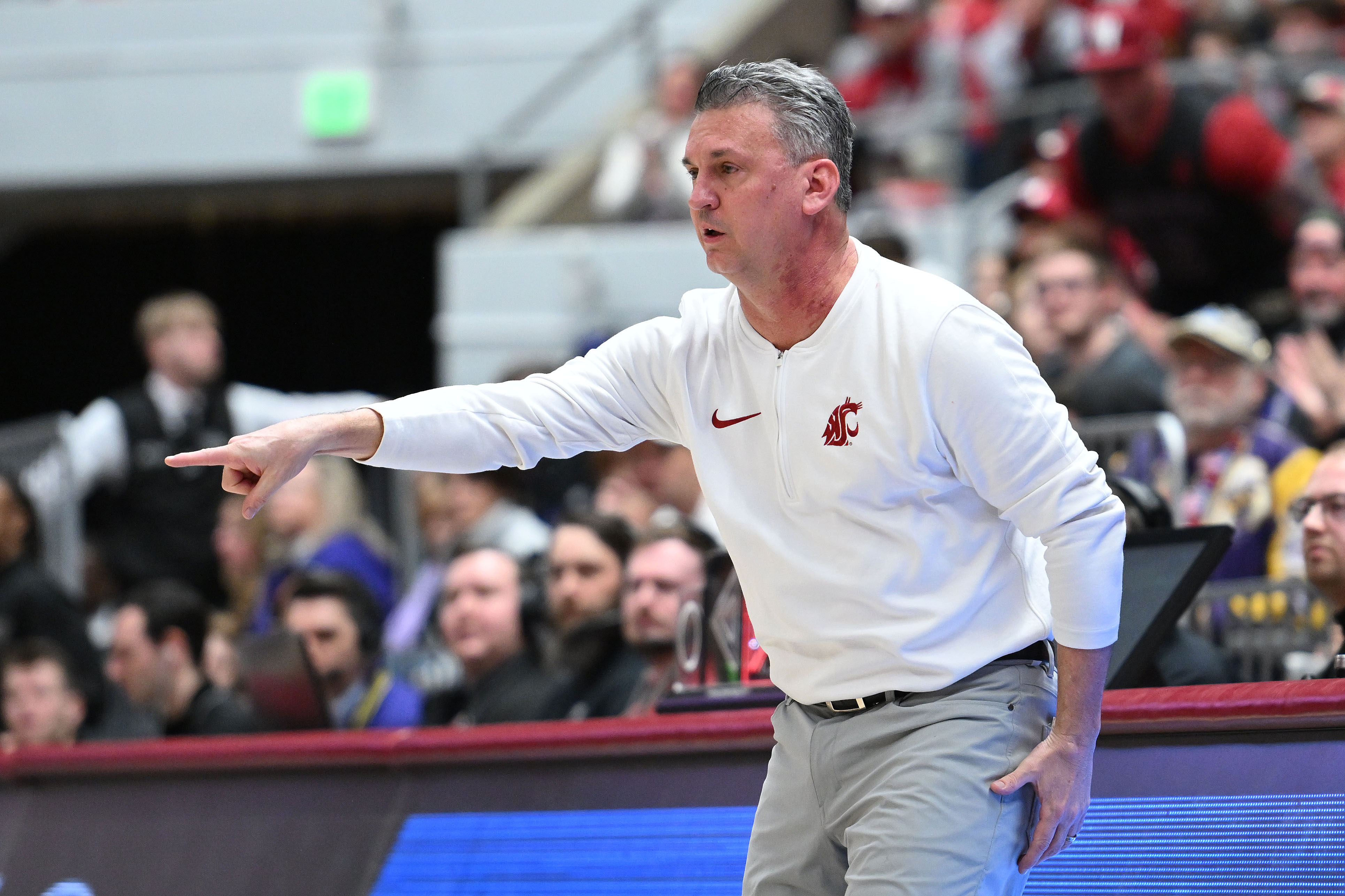 Mar 7, 2024; Pullman, Washington, USA; Washington State Cougars head coach Kyle Smith looks on against the Washington Huskies in the first half at Friel Court at Beasley Coliseum. Mandatory Credit: James Snook-USA TODAY Sports