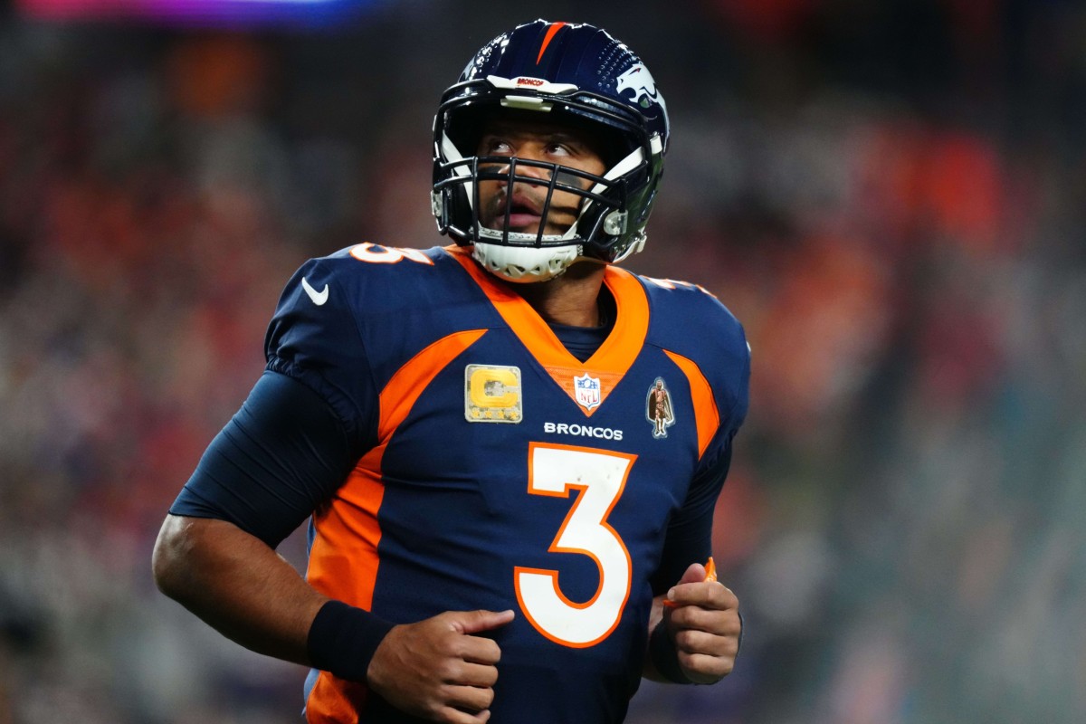 Nov 19, 2023; Denver, Colorado, USA; Denver Broncos quarterback Russell Wilson (3) in the first quarter against the Minnesota Vikings at Empower Field at Mile High.