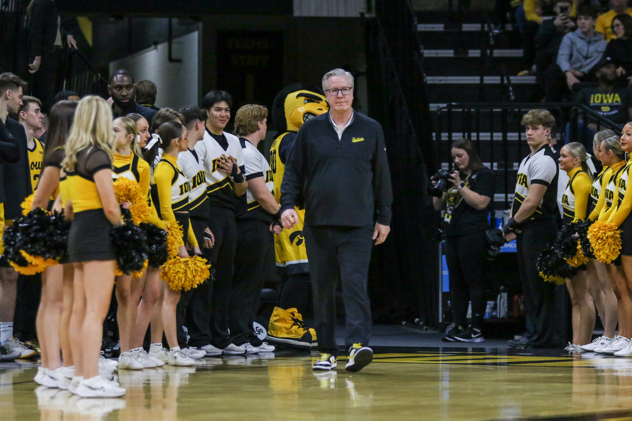Iowa coach Fran McCaffery walks onto the court during Senior Day ceremonies before a game against Illinois on March 10, 2024 at Carver-Hawkeye Arena in Iowa City, Iowa. (Rob Howe/HN)