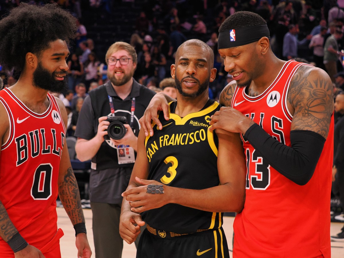  Golden State Warriors guard Chris Paul (3) with Chicago Bulls guard Coby White (0) and forward Torrey Craig (13) after the game at Chase Center.