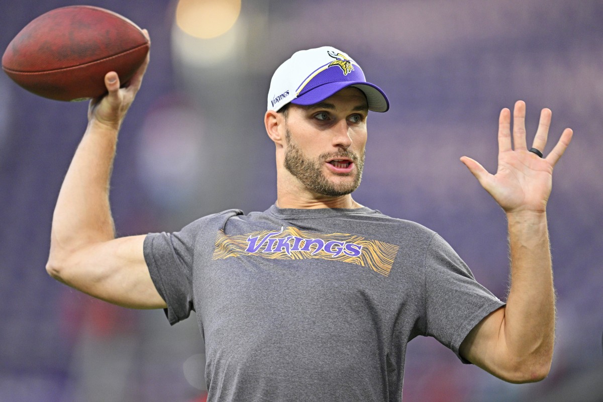 Oct 23, 2023; Minneapolis, Minnesota, USA; Minnesota Vikings quarterback Kirk Cousins (8) warms up before the game against the San Francisco 49ers at U.S. Bank Stadium.