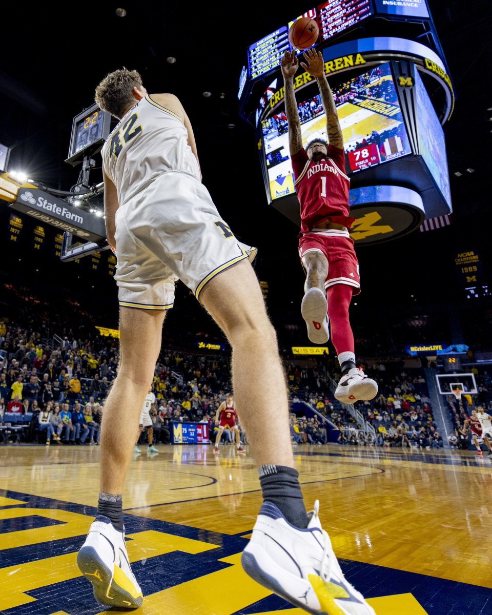 Indiana's 7-foot center Kel'el Ware leaps to block Michigan's in-bounds pass, securing the Hoosiers' 78-75 win on Dec. 5, 2023.