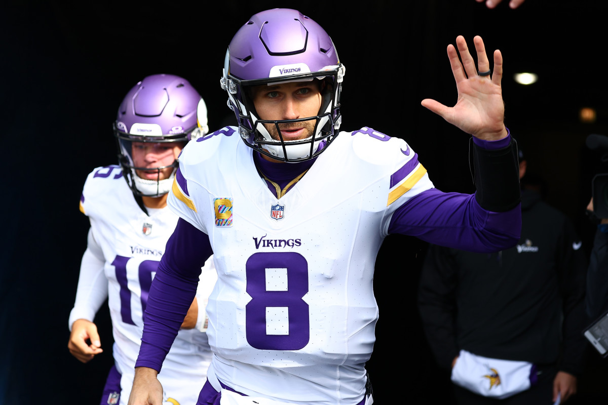 Oct 15, 2023; Chicago, Illinois, USA; Minnesota Vikings quarterback Kirk Cousins (8) takes the field before the game against the Chicago Bears at Soldier Field.