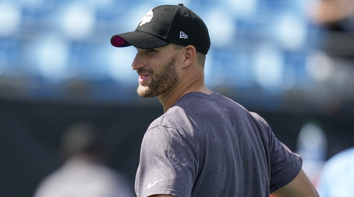 QB Kirk Cousins looks on during a practice