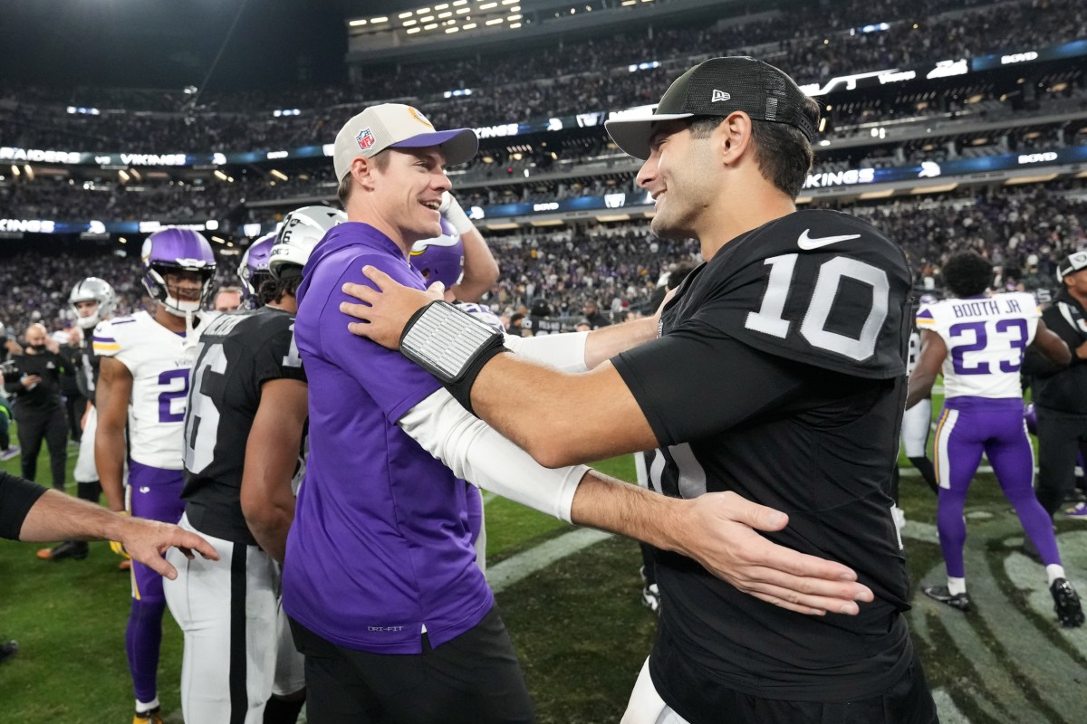 Dec 10, 2023; Paradise, Nevada, USA; Minnesota Vikings coach Kevin O'Connell (left) shakes hands with Las Vegas Raiders quarterback Jimmy Garoppolo (10) after the game at Allegiant Stadium.
