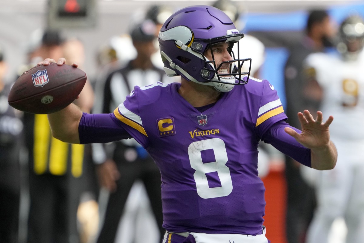 Minnesota Vikings quarterback Kirk Cousins (8) throws the ball in the first half against the New Orleans Saints.
