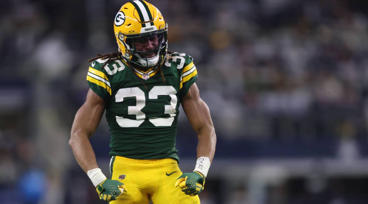 Packers running back Aaron Jones flexes in a game vs. the Cowboys.