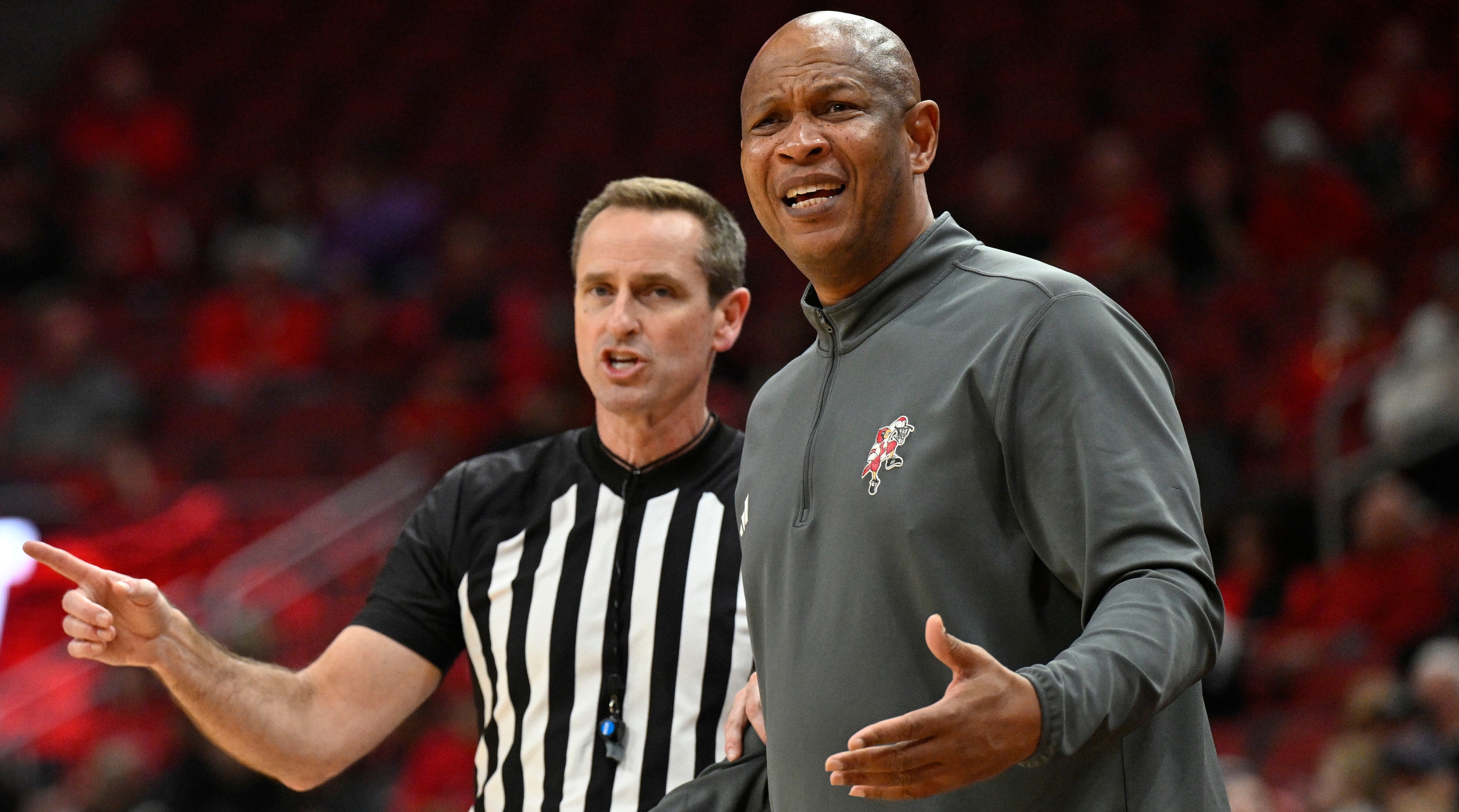 Louisville Cardinals head coach Kenny Payne reacts to a call during the first half of a game against the Virginia Tech Hokies.