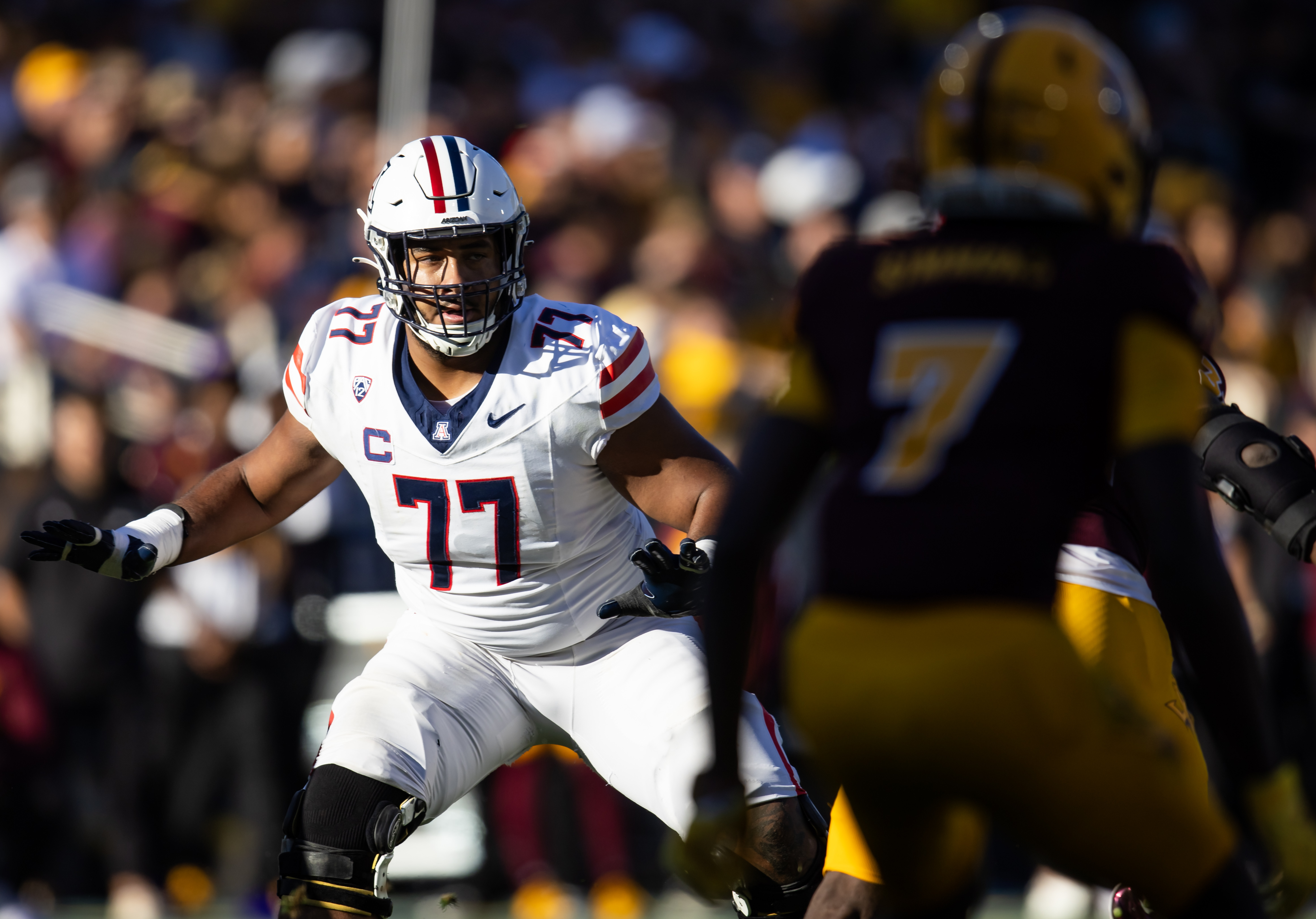 Jordan Morgan shuffles to keep up with the ASU linemen