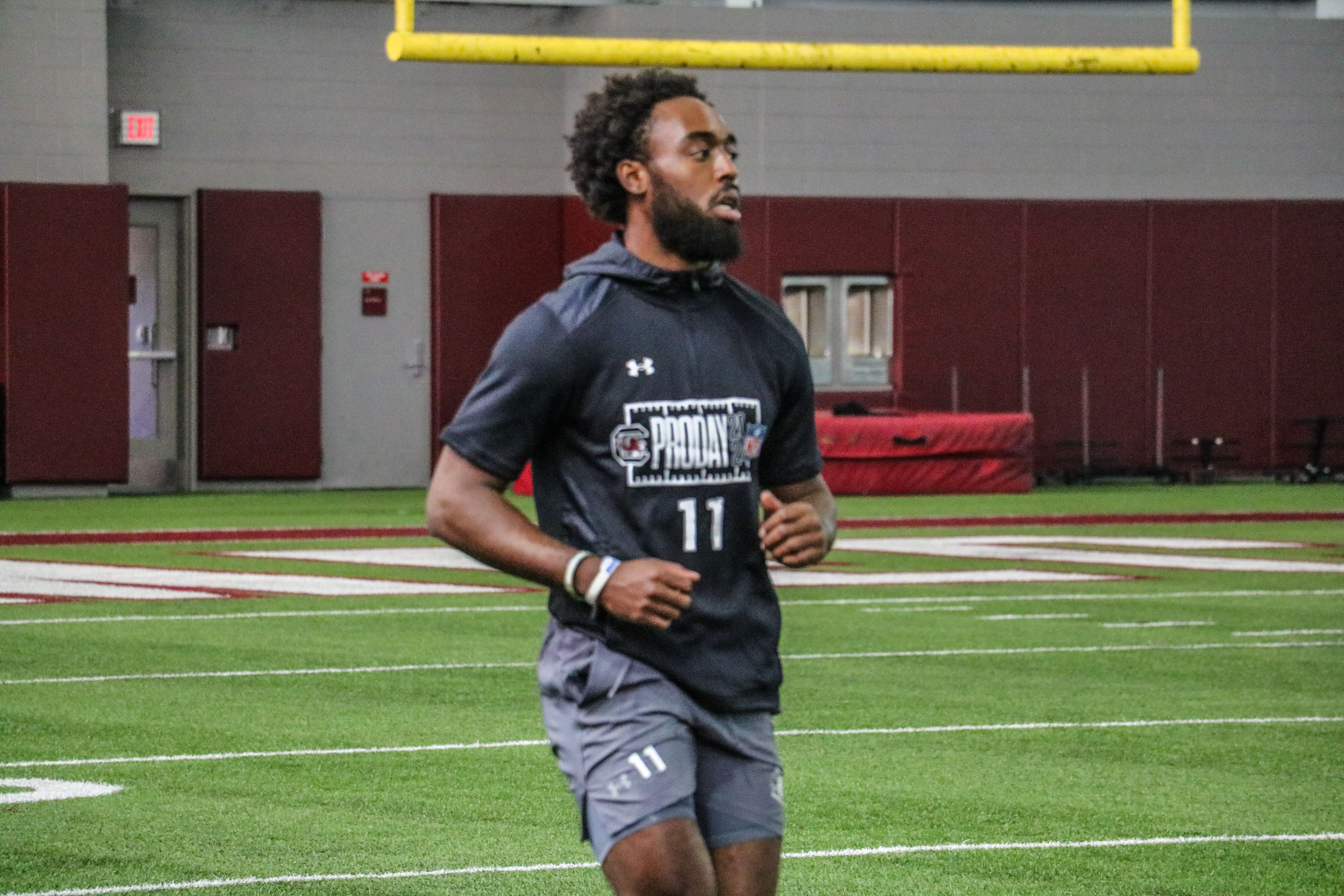 Eddie Lewis getting warmed up for the 40-yard dash.