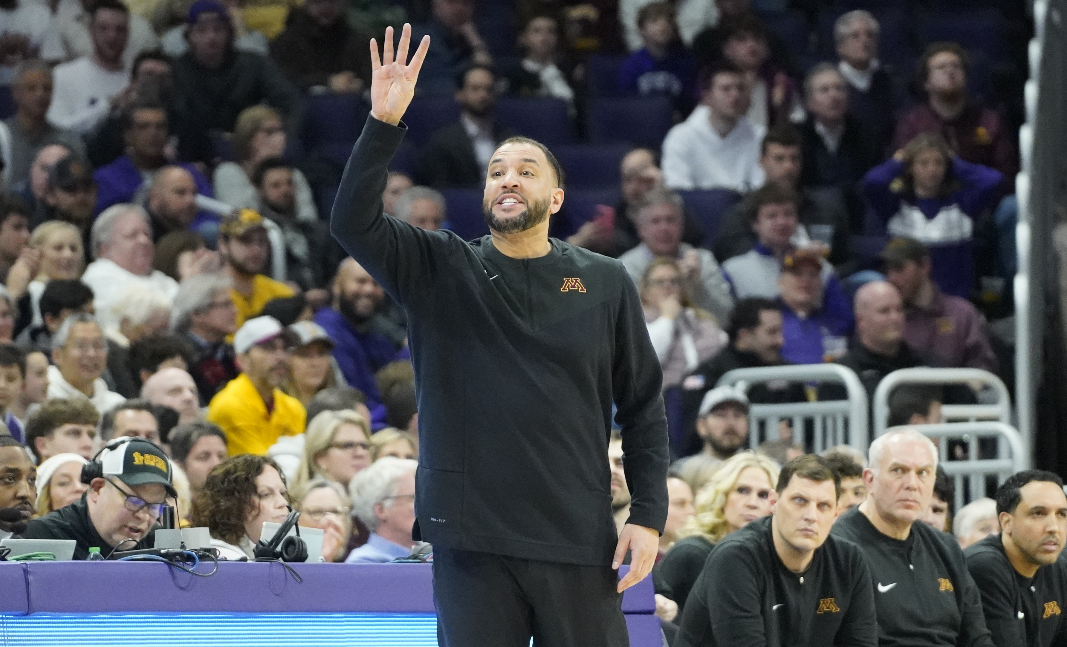 Minnesota head coach Ben Johnson gestures to his team against Northwestern during the first half at Welsh-Ryan Arena in Evanston, Ill., on March 9, 2024.