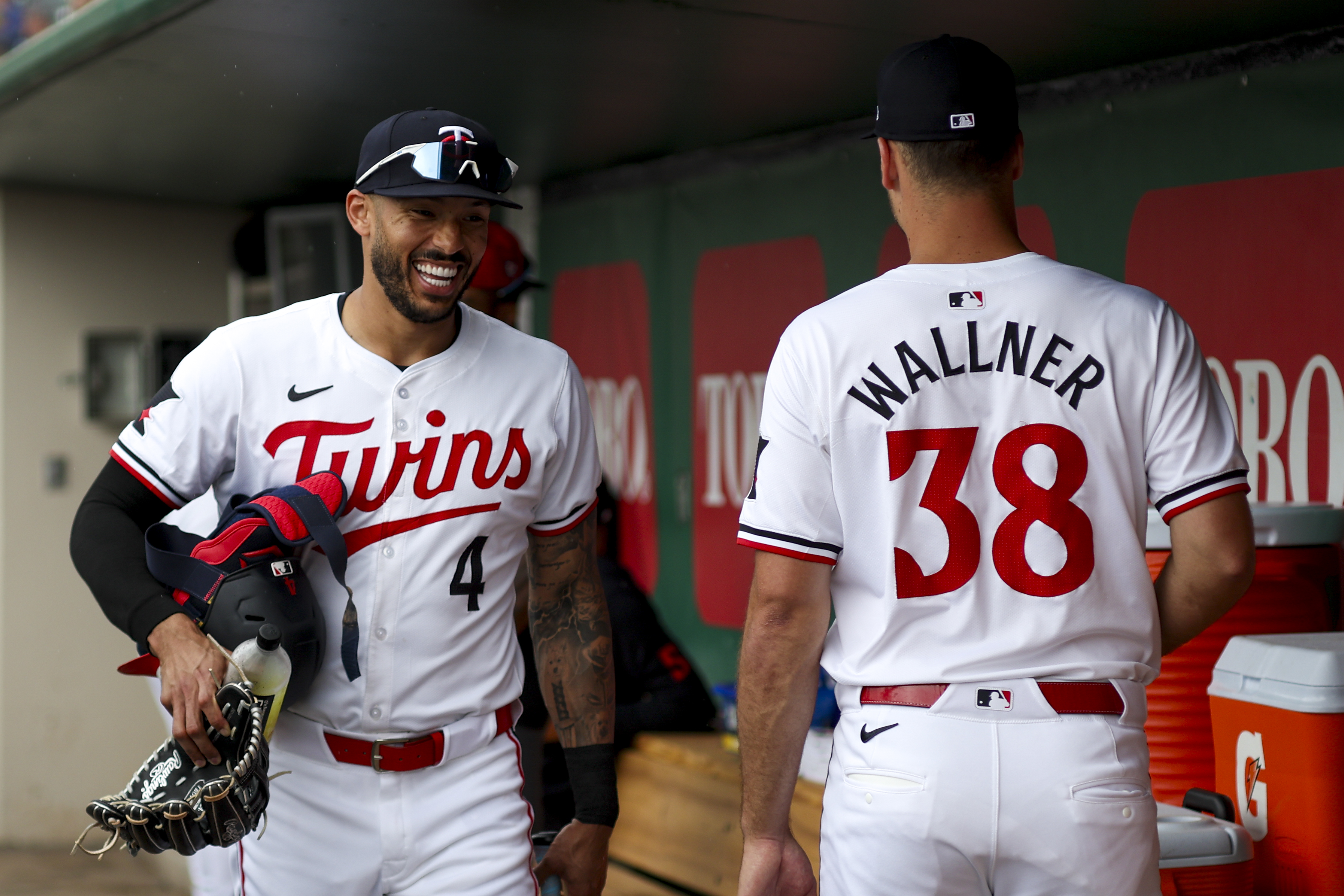 Mar 6, 2024; Fort Myers, Florida, USA; Minnesota Twins shortstop Carlos Correa (4) and starting pitcher Joe Ryan (41) get ready for a game against the Boston Red Sox at Hammond Stadium.