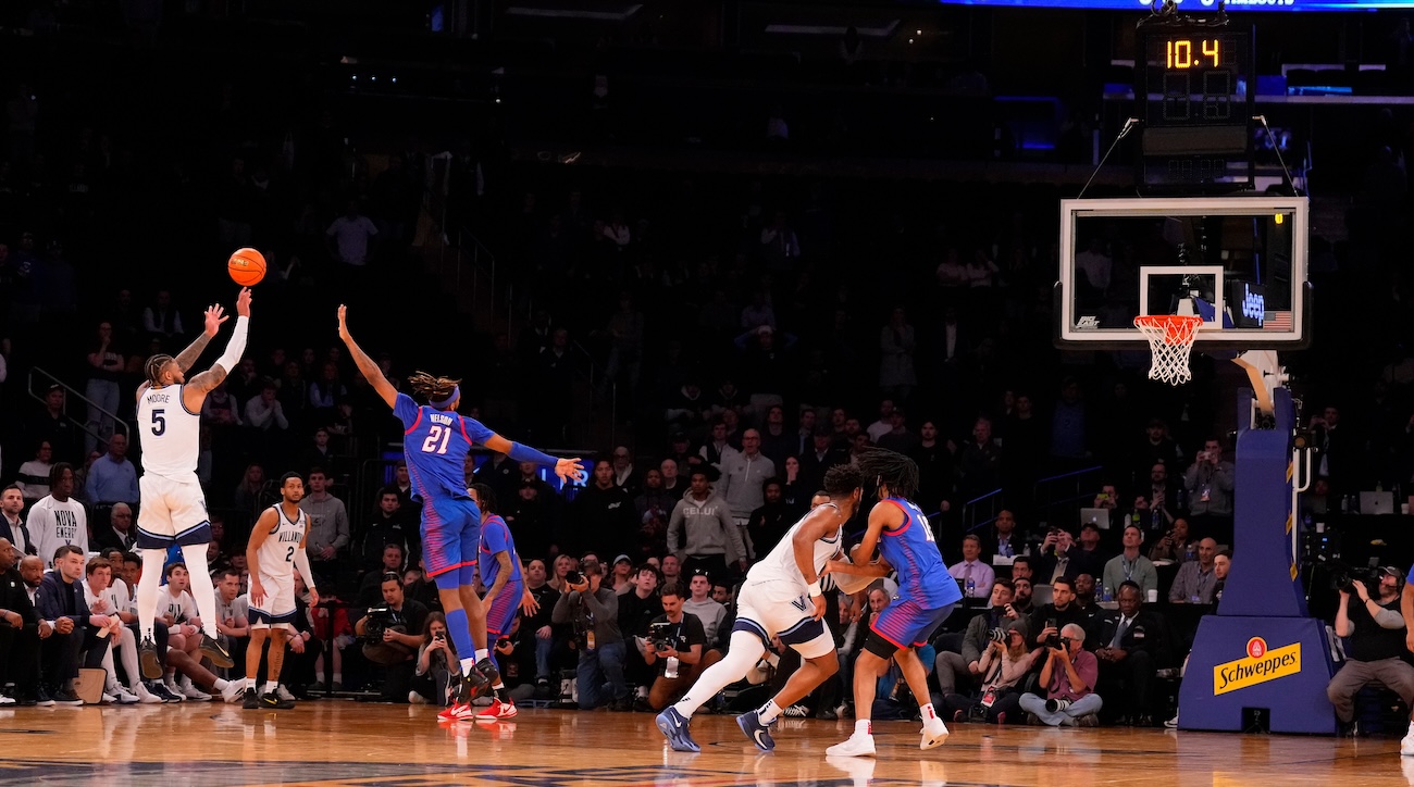 Villanova Wildcats guard Justin Moore (5) hits a three-point shot against DePaul during the second half at Madison Square Garden in New York City on March 13, 2024.