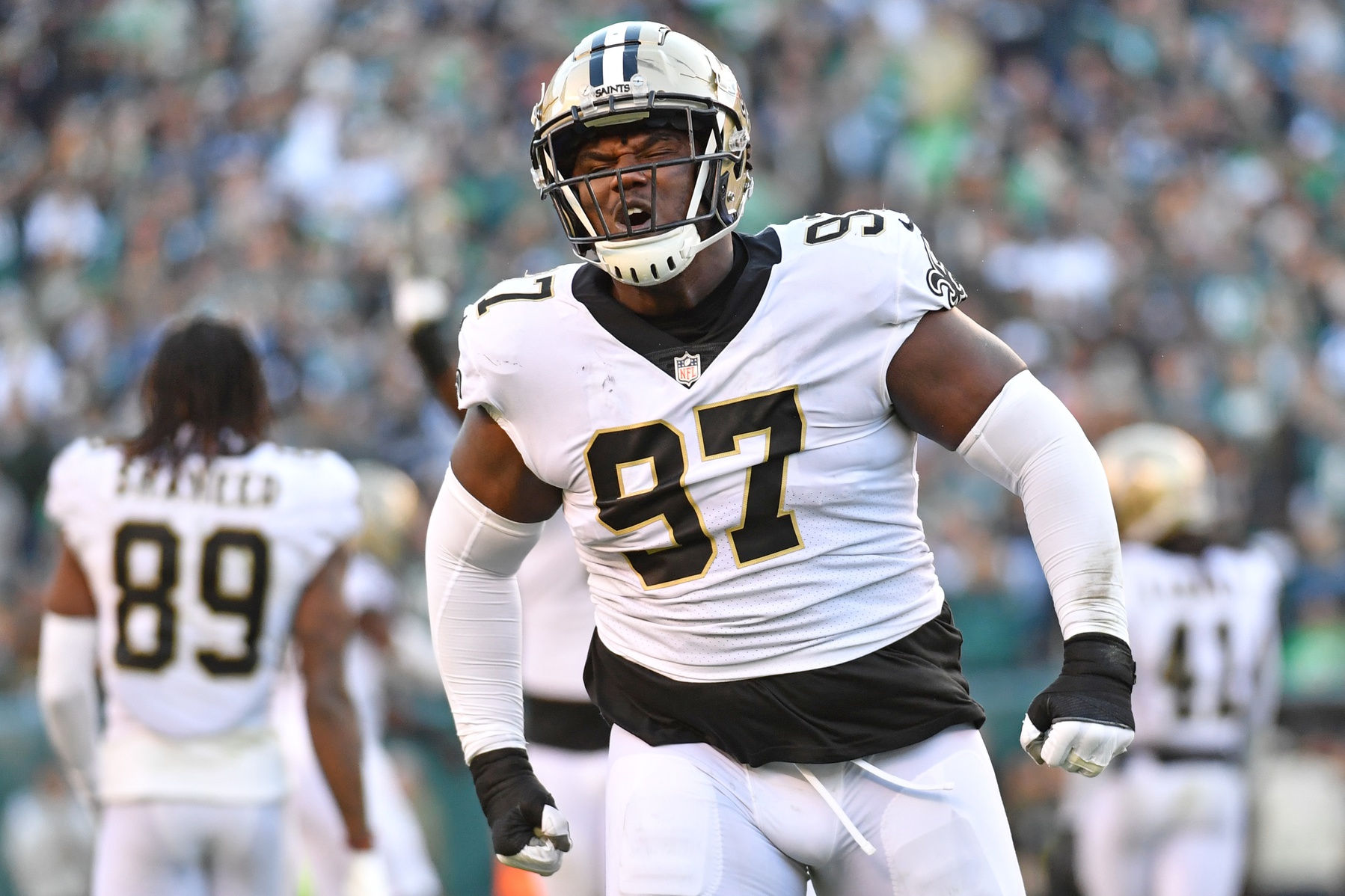 New Orleans Saints defensive end Malcolm Roach (97) celebrate a stop on fourth down during the fourth quarter against the Philadelphia Eagles at Lincoln Financial Field.