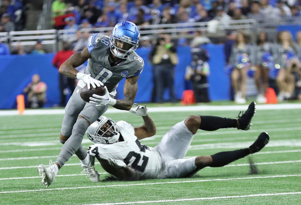 Detroit Lions wide receiver Josh Reynolds (8) catches a pass against Raiders cornerback Marcus Peters. © Kirthmon F. Dozier / USA TODAY NETWORK