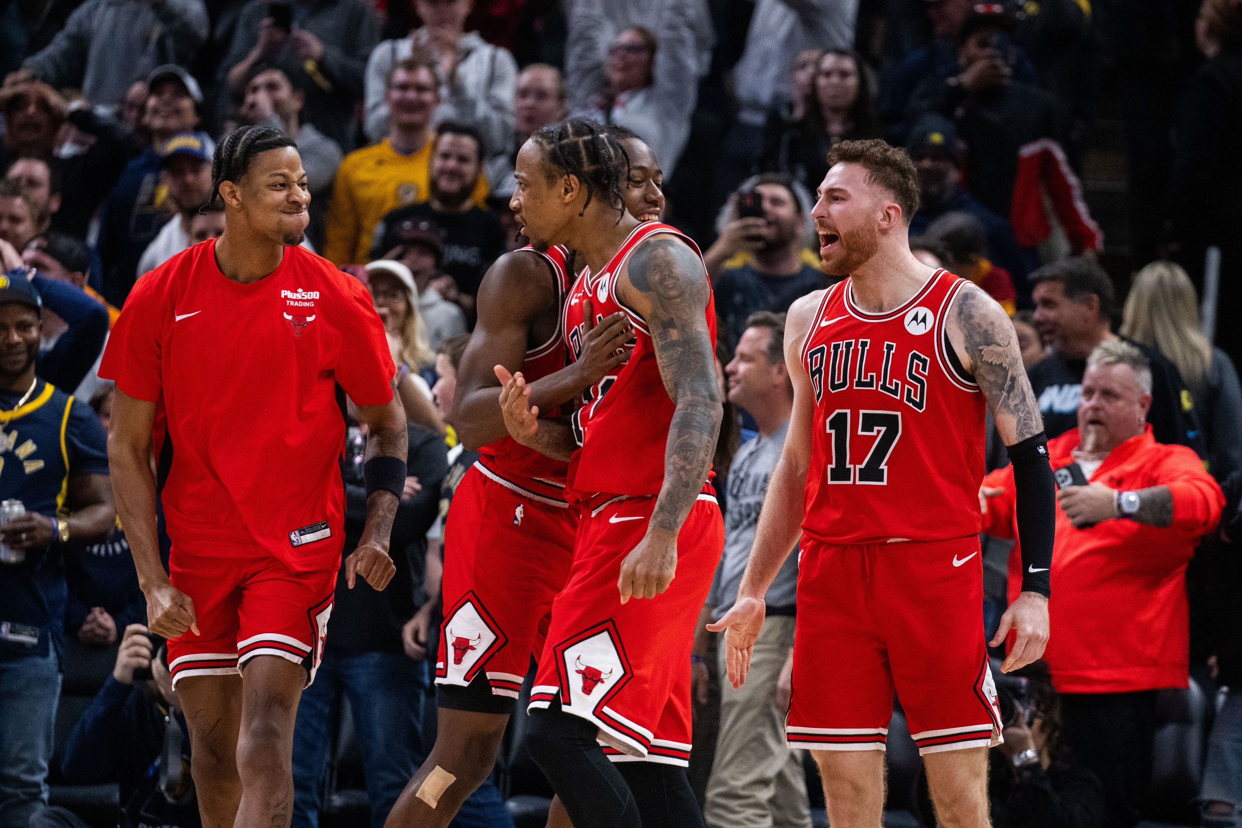 Chicago Bulls forward DeMar DeRozan (11) celebrates with his team his basket to tie the game and go to overtime against the Indiana Pacers at Gainbridge Fieldhouse.
