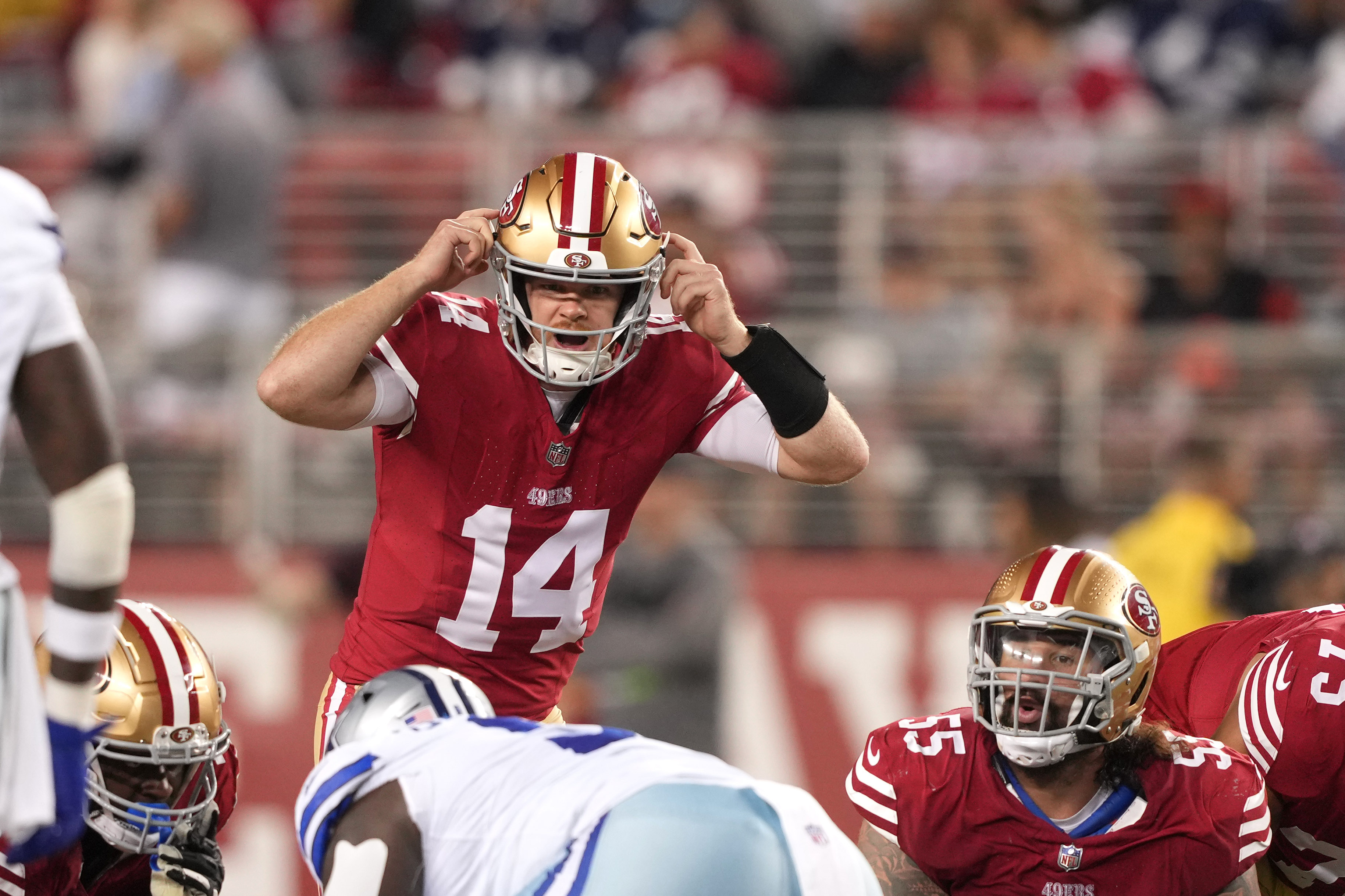 Oct 8, 2023; Santa Clara, California, USA; San Francisco 49ers quarterback Sam Darnold (14) gestures during the fourth quarter against the Dallas Cowboys at Levi's Stadium.