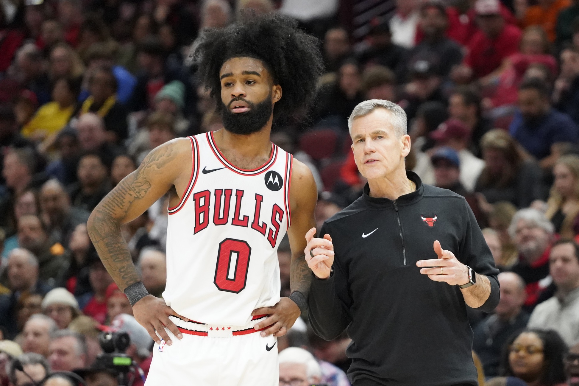 Chicago Bulls guard Coby White (0) talks with head coach Billy Donovan 
