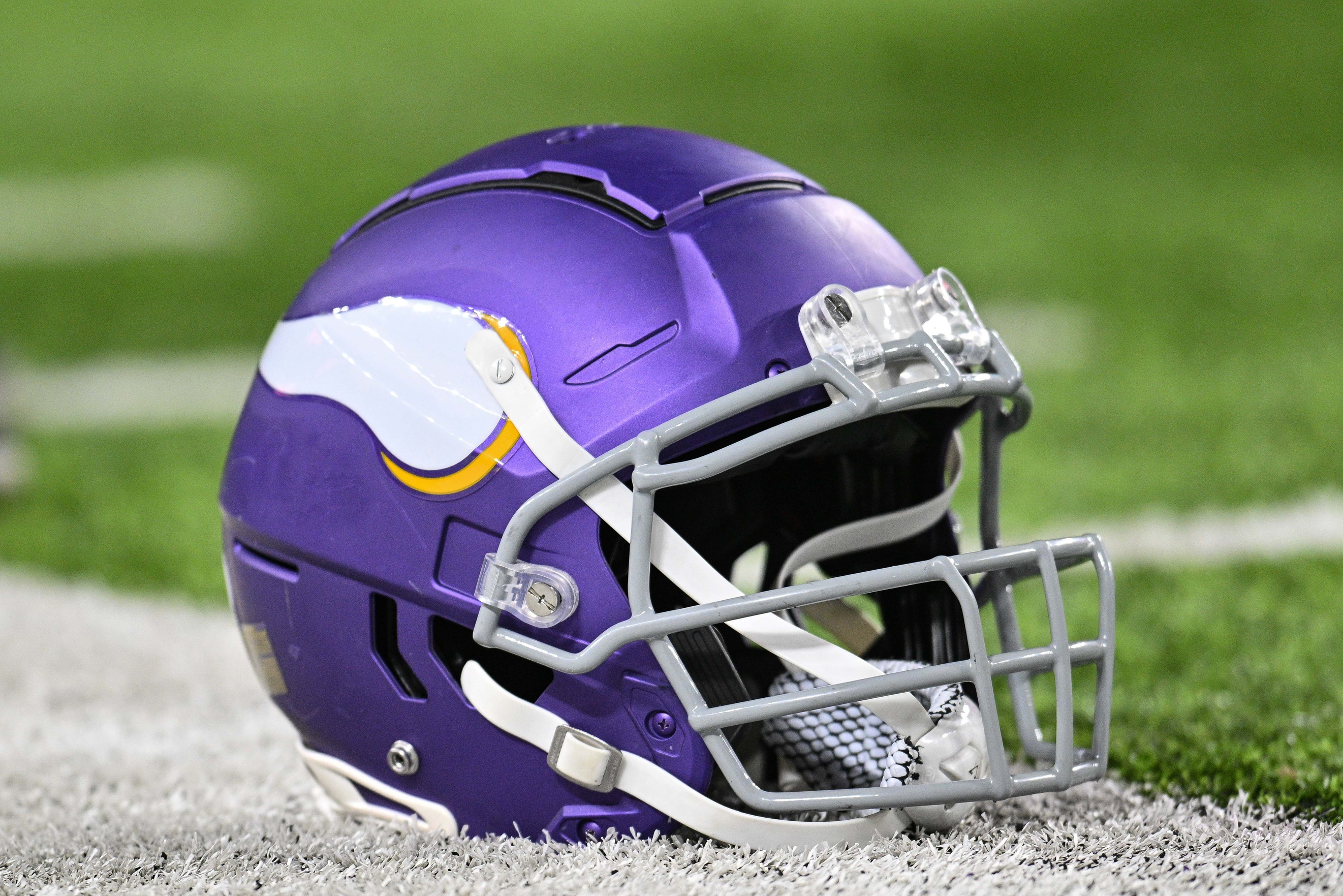 Nov 27, 2023; Minneapolis, Minnesota, USA; A Minnesota Vikings helmet sits idle on the field before the game between the Minnesota Vikings and the Chicago Bears at U.S. Bank Stadium.