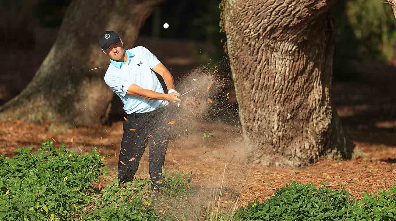 Jordan Spieth plays his third shot on the 14th hole during the second round of the 2024 Players Championship on the Stadium Course at TPC Sawgrass in Ponte Vedra Beach, Fla.