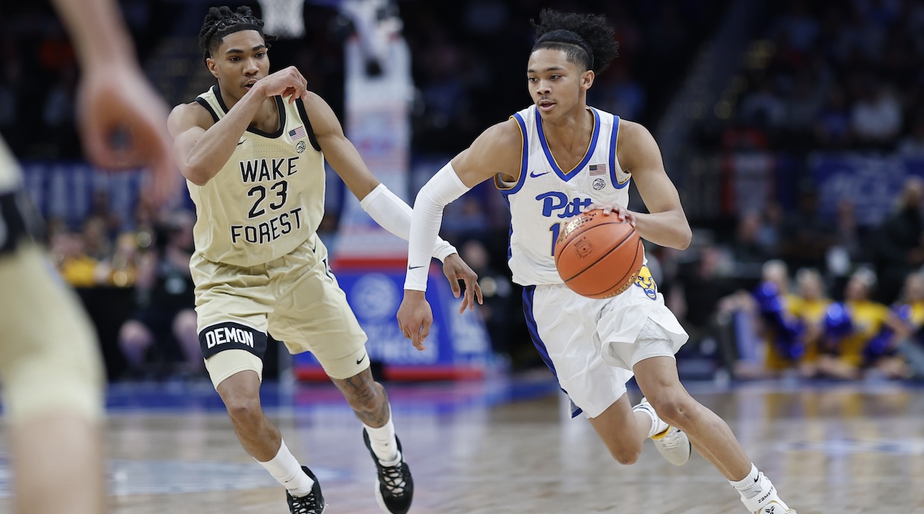 Pittsburgh Panthers guard Jaland Lowe (15) drives to the basket as Wake Forest Demon Deacons guard Hunter Sallis (23) chases in the first half at Capital One Arena in Washington, D.C., on March 14, 2024.