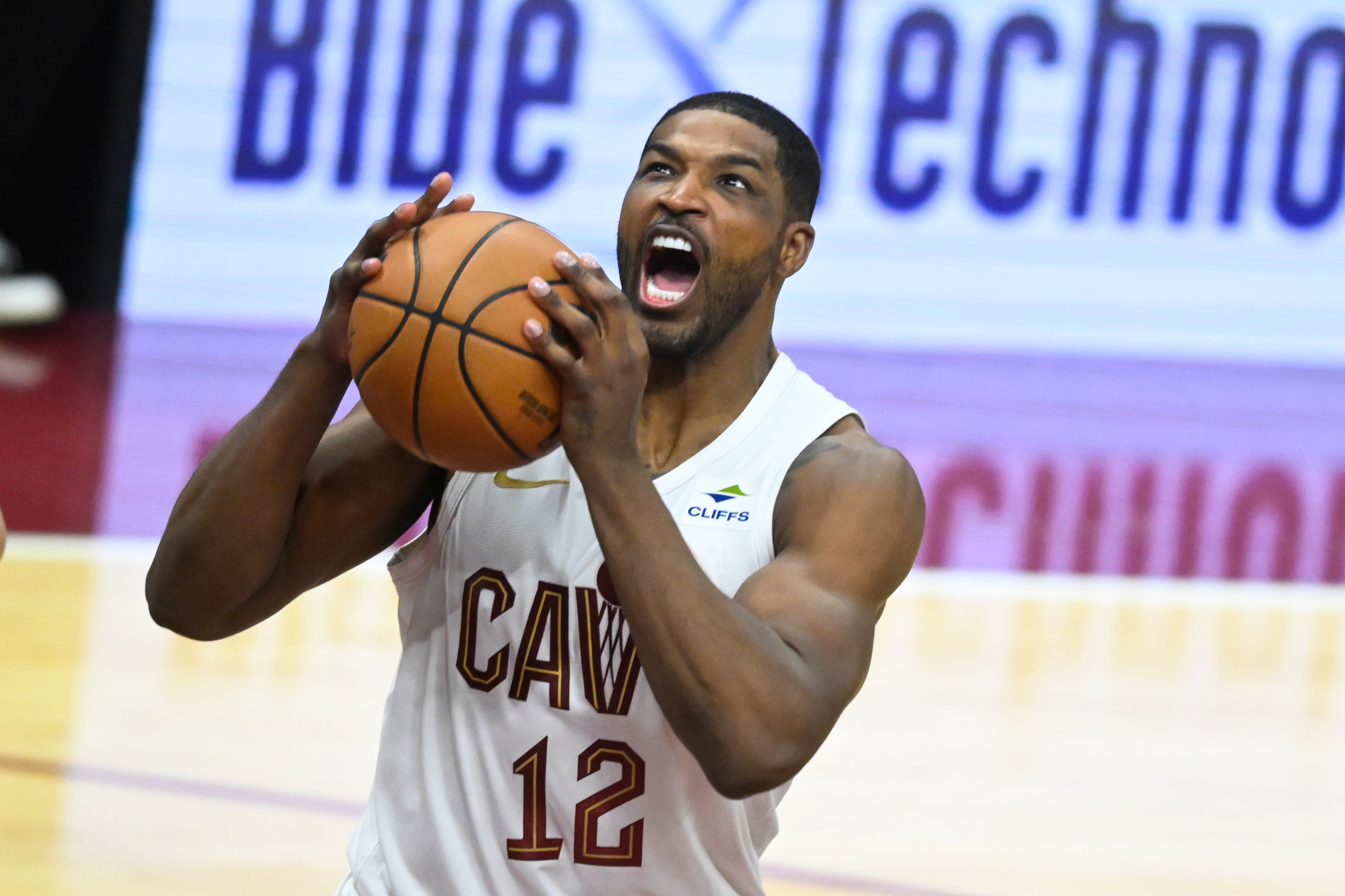 Dec 21, 2023; Cleveland, Ohio, USA; Cleveland Cavaliers center Tristan Thompson (12) rebounds in the fourth quarter against the New Orleans Pelicans at Rocket Mortgage FieldHouse.
