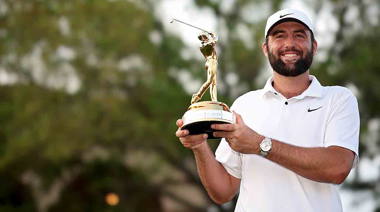 Scottie Scheffler poses with the trophy after winning the 2024 Players Championship at TPC Sawgrass in Ponte Vedra Beach, Fla.