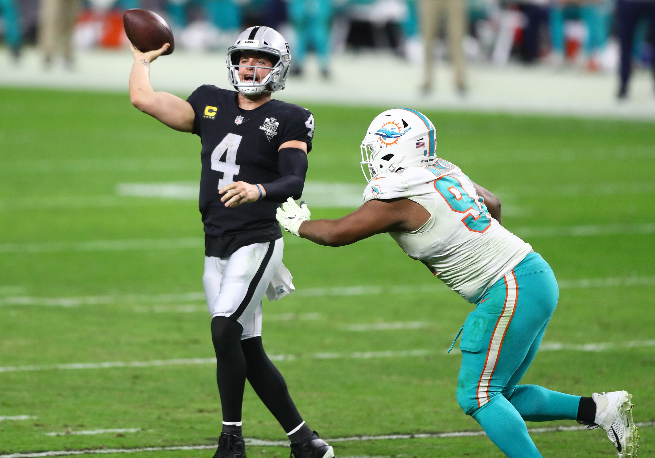 New Las Vegas Raiders defensive tackle Christian Wilkins (right) has faced the Raiders three times in his career and is quite familiar with the intensity Raider Nation brings.