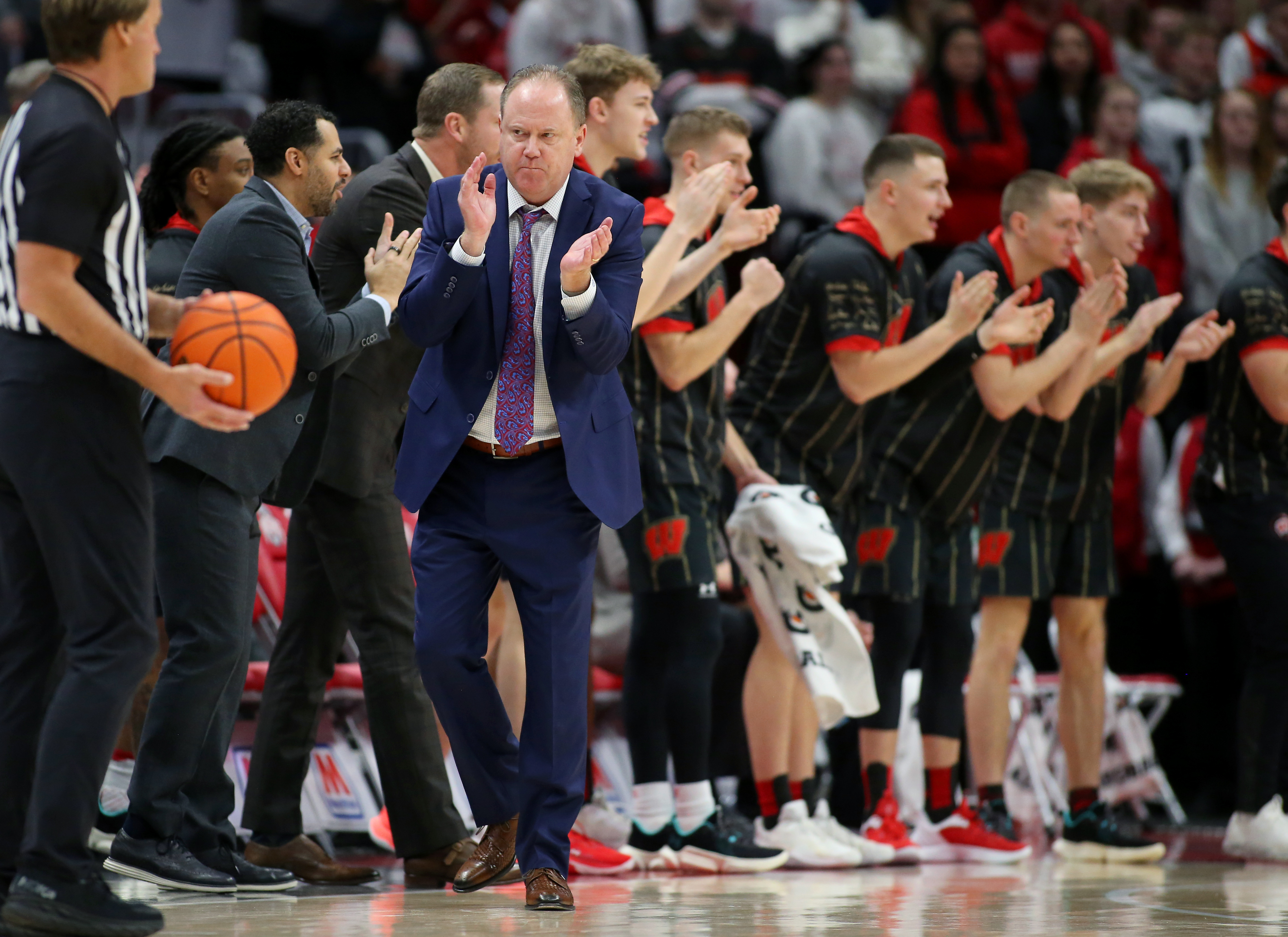 Wisconsin Badgers head coach Greg Gard celebrates during the first half against the Ohio State Buckeyes at Value City Arena