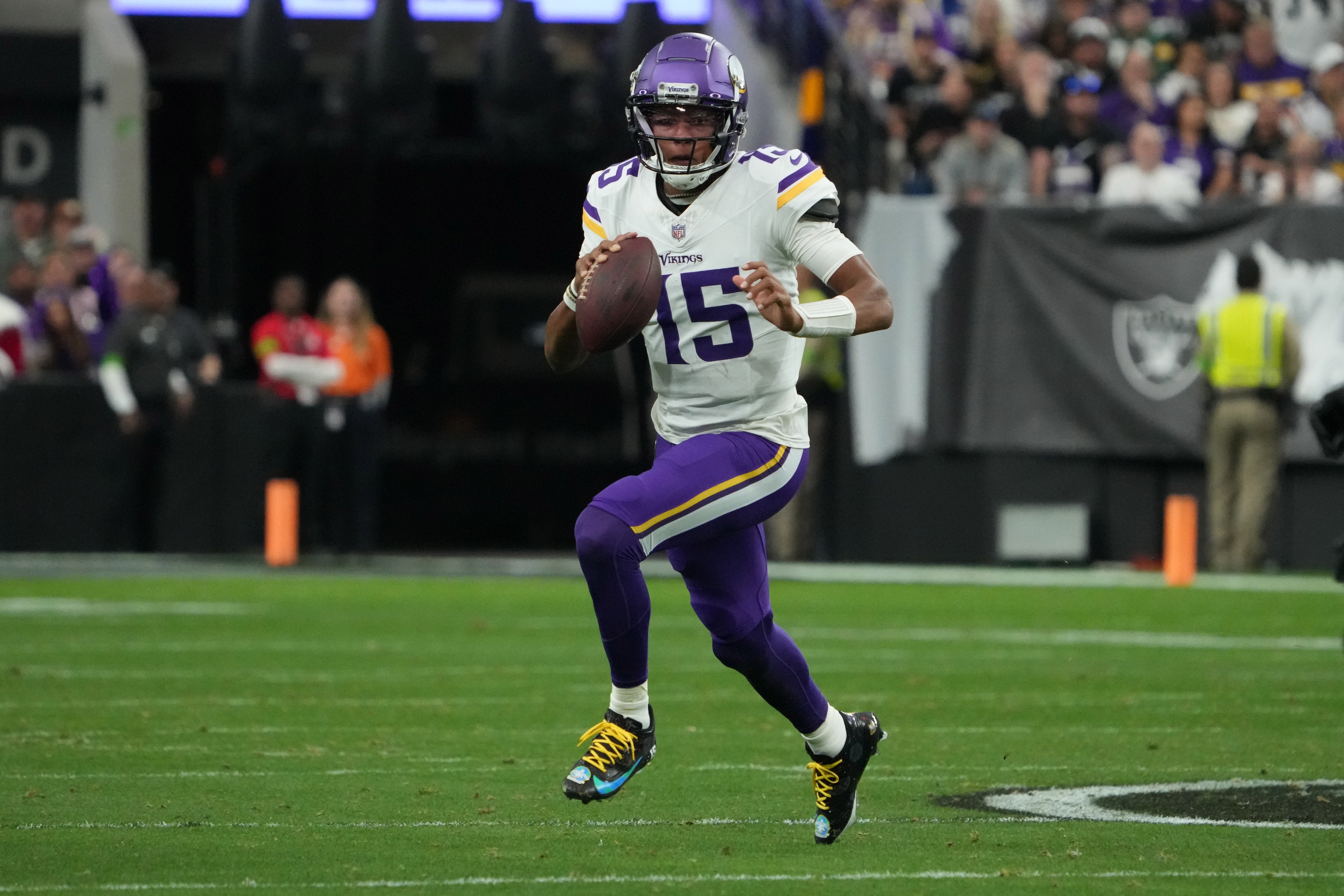 Dec 10, 2023; Paradise, Nevada, USA; Minnesota Vikings quarterback Joshua Dobbs (15) throws the ball against the Las Vegas Raiders in the first half at Allegiant Stadium.
