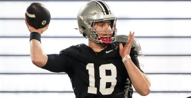 Ohio State Buckeyes quarterback Will Howard attempts a pass during college football's 2024 spring practice.