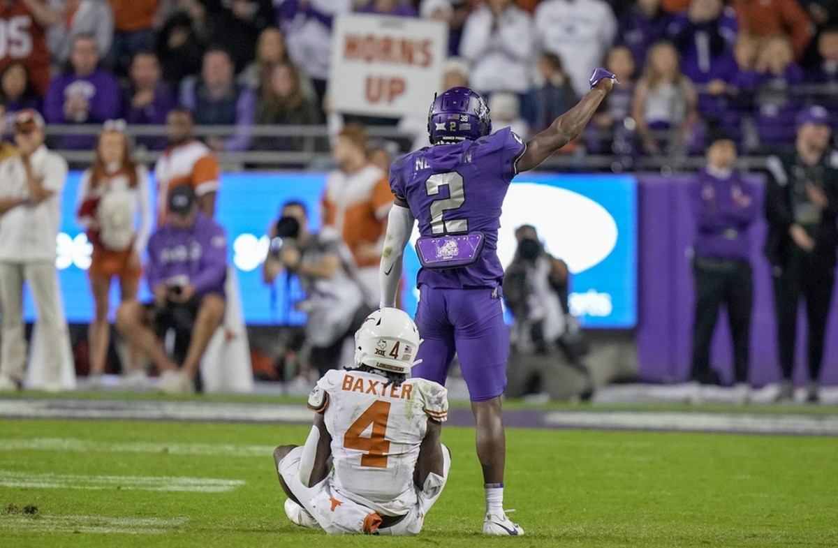 TCU Horned Frogs cornerback Josh Newton (2) celebrates a thread down stop against Texas Longhorns running back CJ Baxter (4) late in the fourth quarter of an NCAA college football game, Saturday, November. 11, 2023, at Amon G. Carter Stadium in Fort Worth, Texas.  
