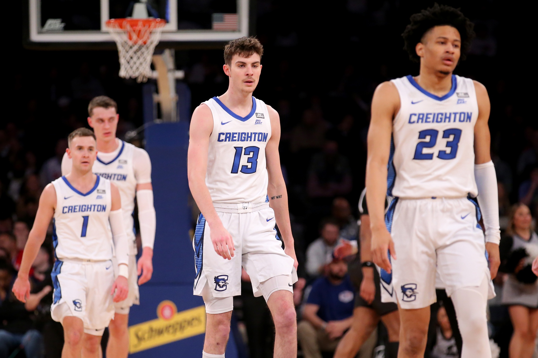 Mar 14, 2024; New York City, NY, USA; Creighton Bluejays guard Steven Ashworth (1) and center Ryan Kalkbrenner (11) and forward Mason Miller (13) and guard Trey Alexander (23) react during the first half against the Providence Friars at Madison Square Garden.