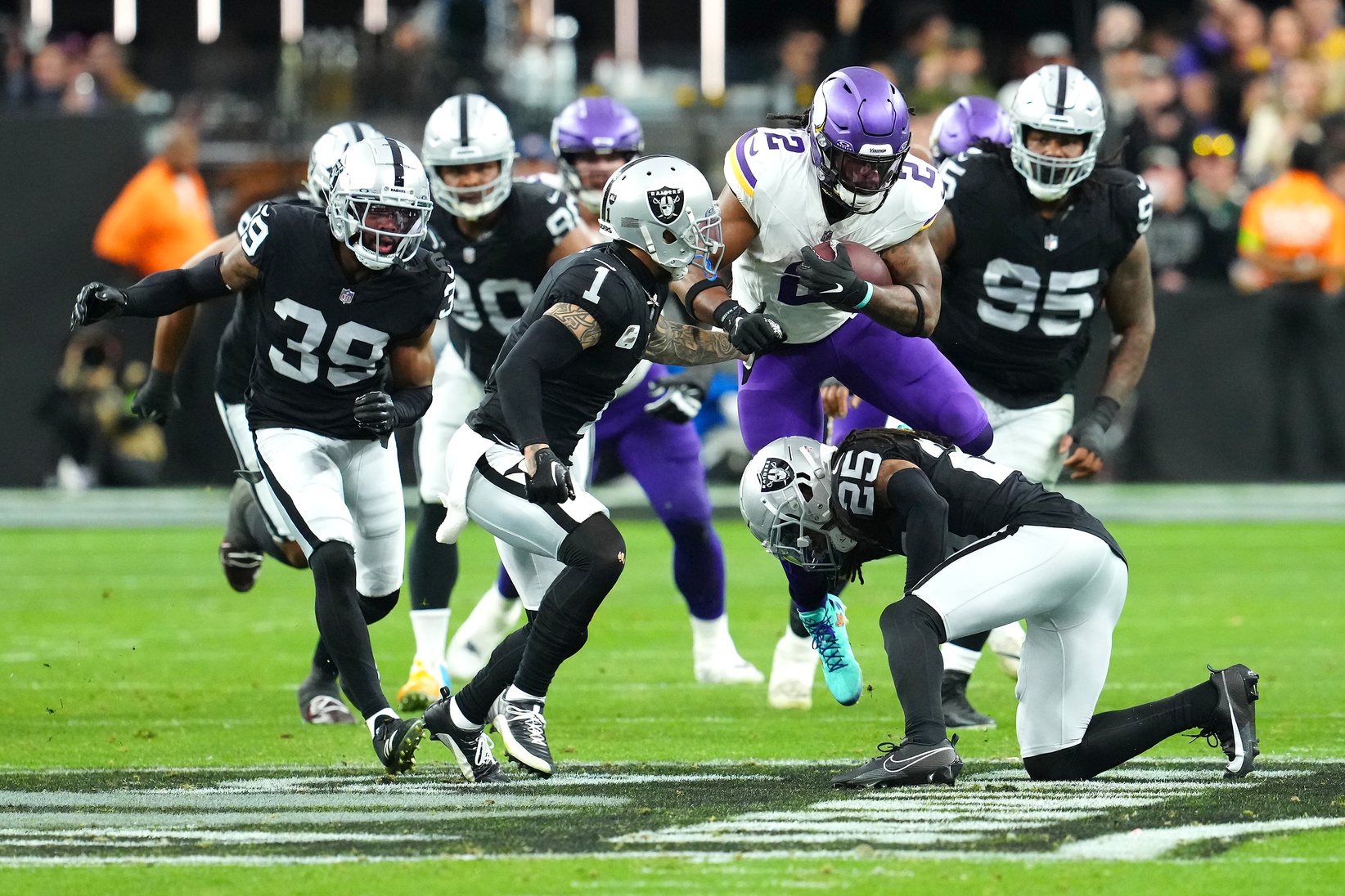 New Las Vegas Raiders running back Alexander Mattison's (2) 2023 campaign took a turn for the worst when he suffered an ankle injury against the Raiders in Week 14.