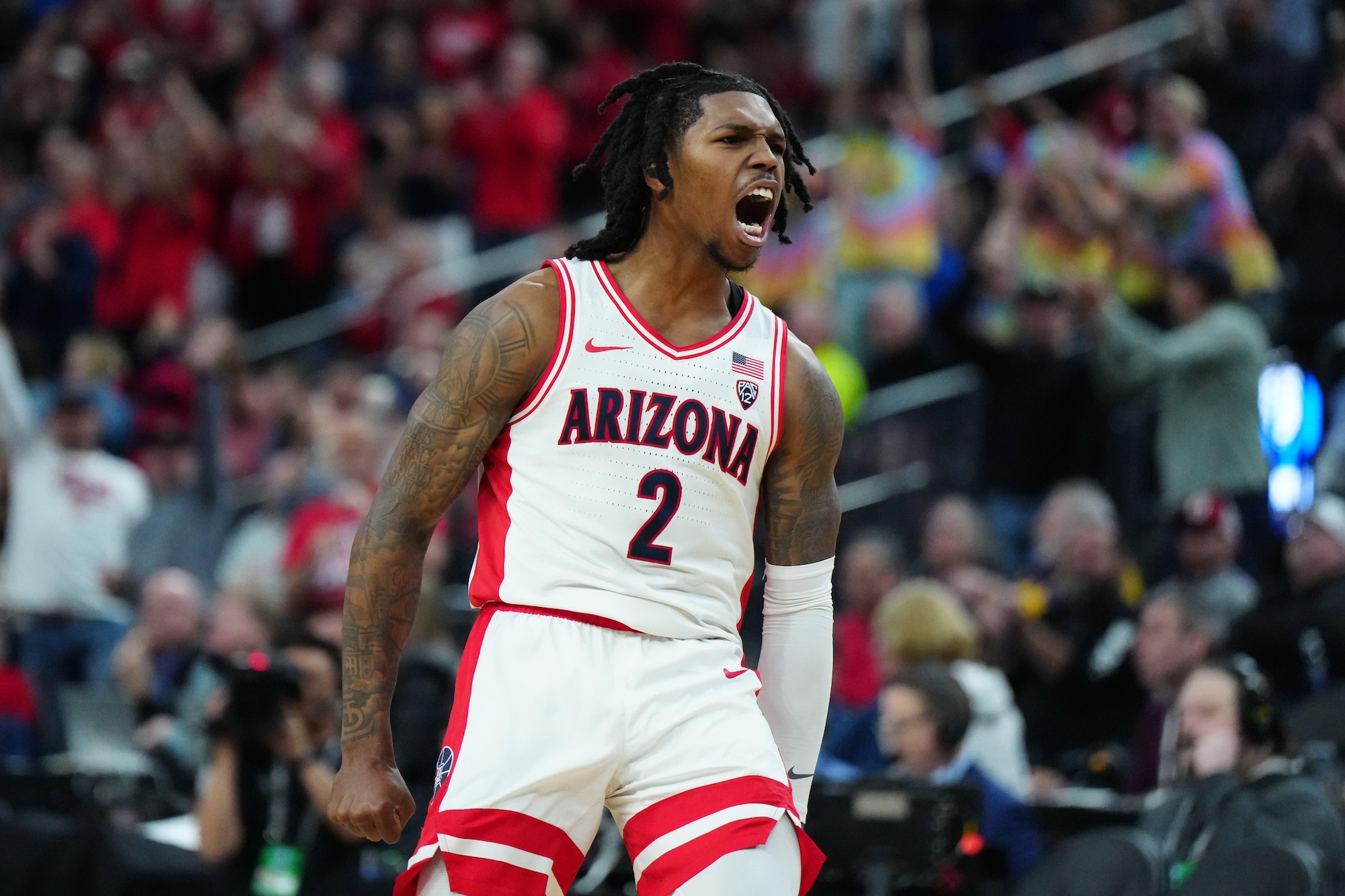 Arizona Wildcats guard Caleb Love (2) celebrates against the Southern California Trojans in the second half at T-Mobile Arena in Las Vegas on March 14, 2024.