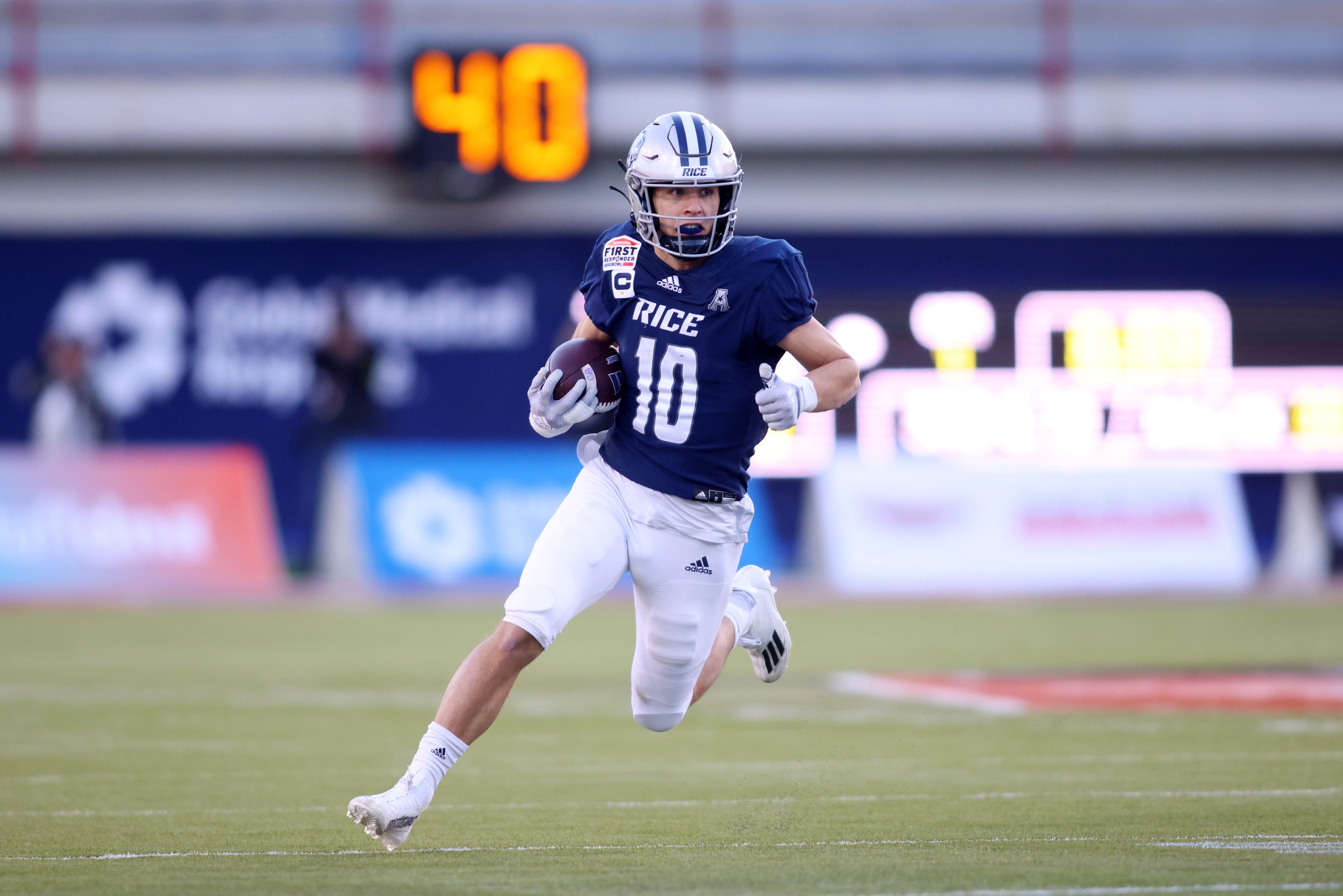 Rice Owls receiver Luke McCaffrey (10) runs after a catch against the Texas State Bobcats. Mandatory Credit: Tim Heitman-USA TODAY Sports