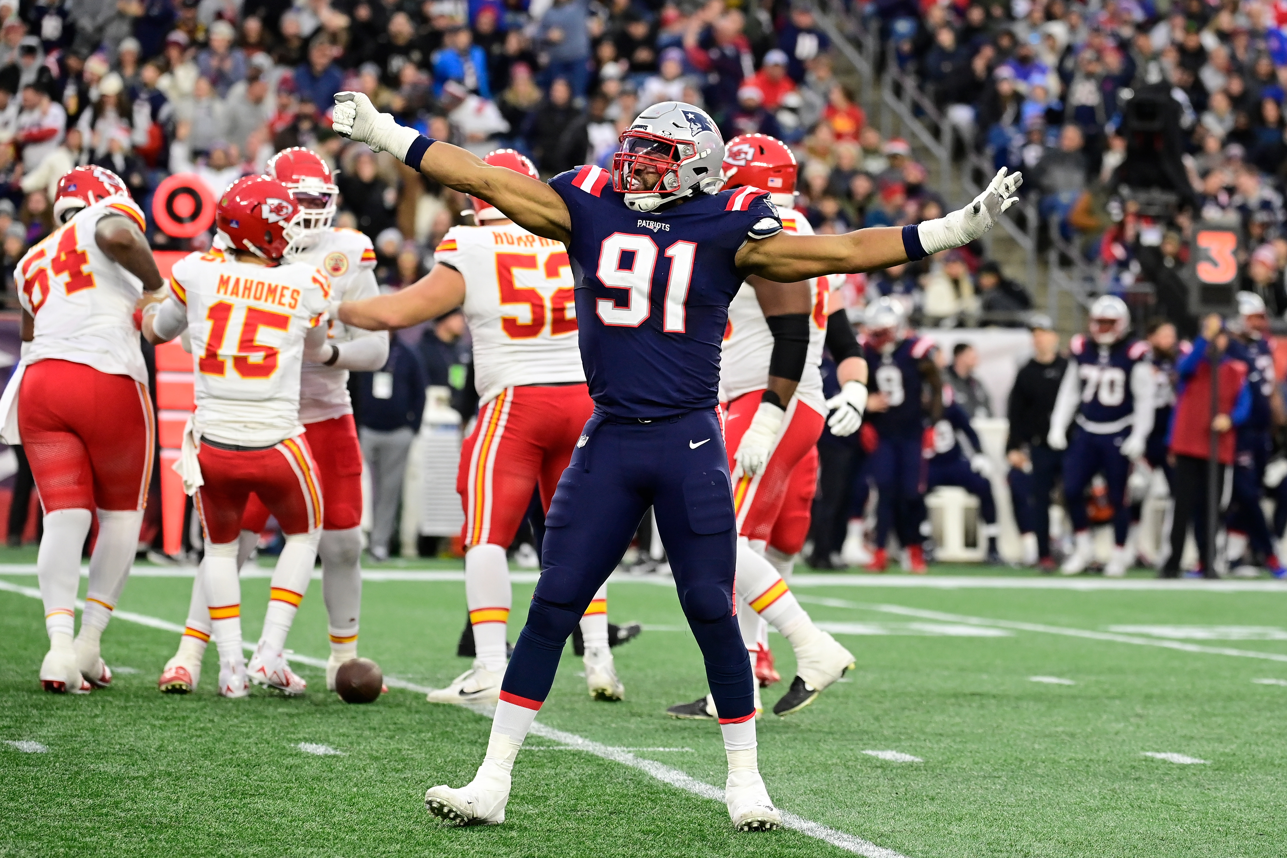 Dec 17, 2023; Foxborough, Massachusetts, USA; New England Patriots defensive end Deatrich Wise Jr. (91) reacts to getting a sack during the second half against the Kansas City Chiefs at Gillette Stadium. 