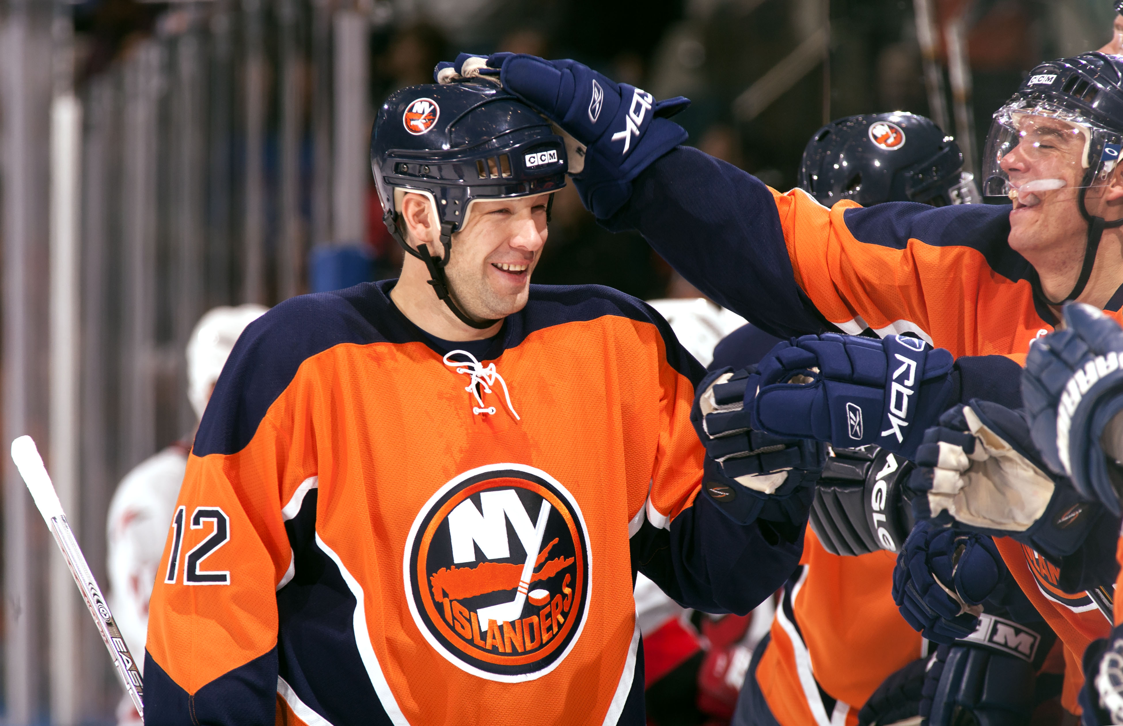New York Islanders left wing Chris Simon (12) celebrates with teammates against the Carolina Hurricanes at Nassau Veterans Memorial Coliseum in Uniondale, N.Y., on Oct. 21, 2006.