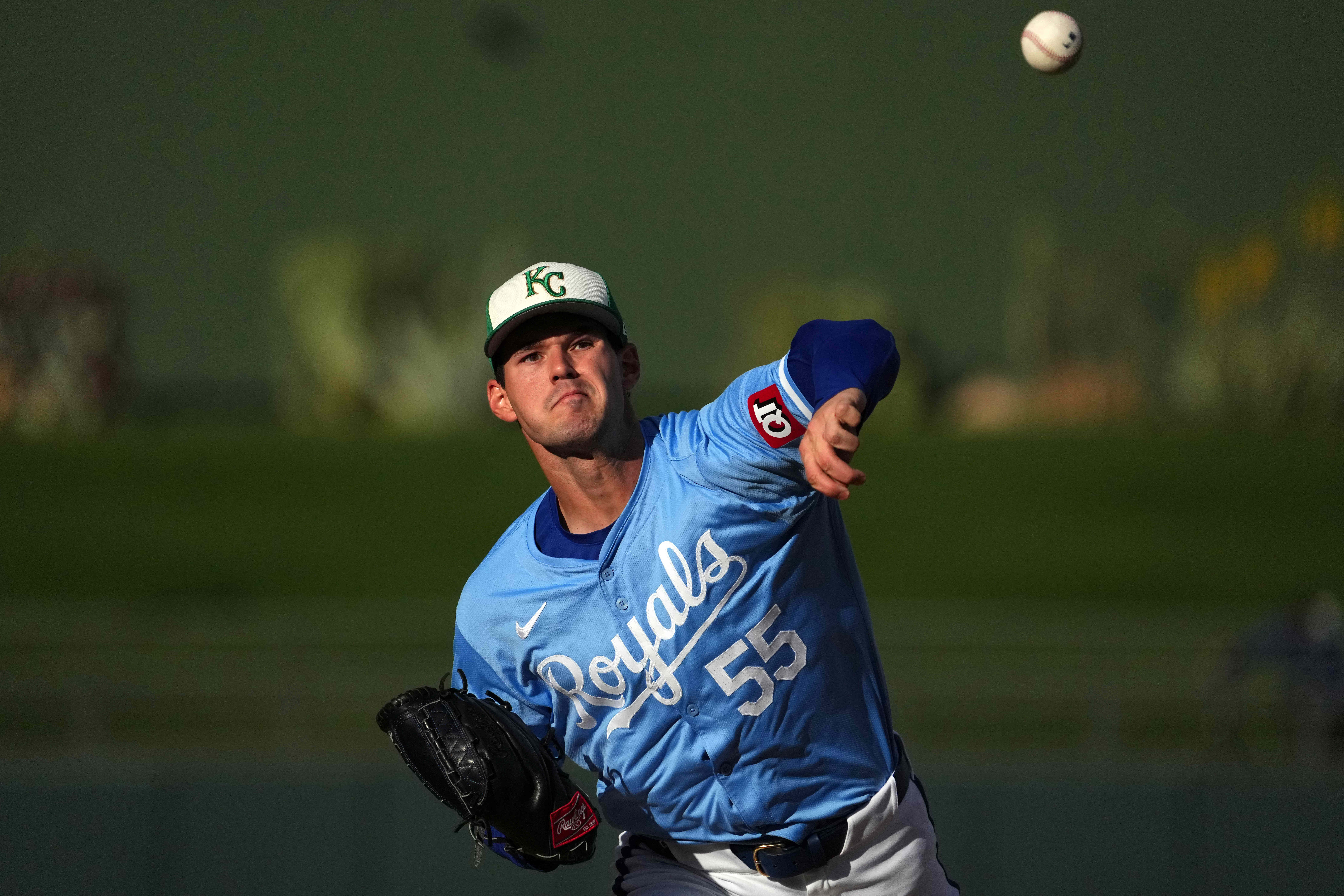 Kansas City Royals starting pitcher Cole Ragans (55) pitches against the Milwaukee Brewers during the second inning at Surprise Stadium in Surprise, Ariz., on March 17, 2024.