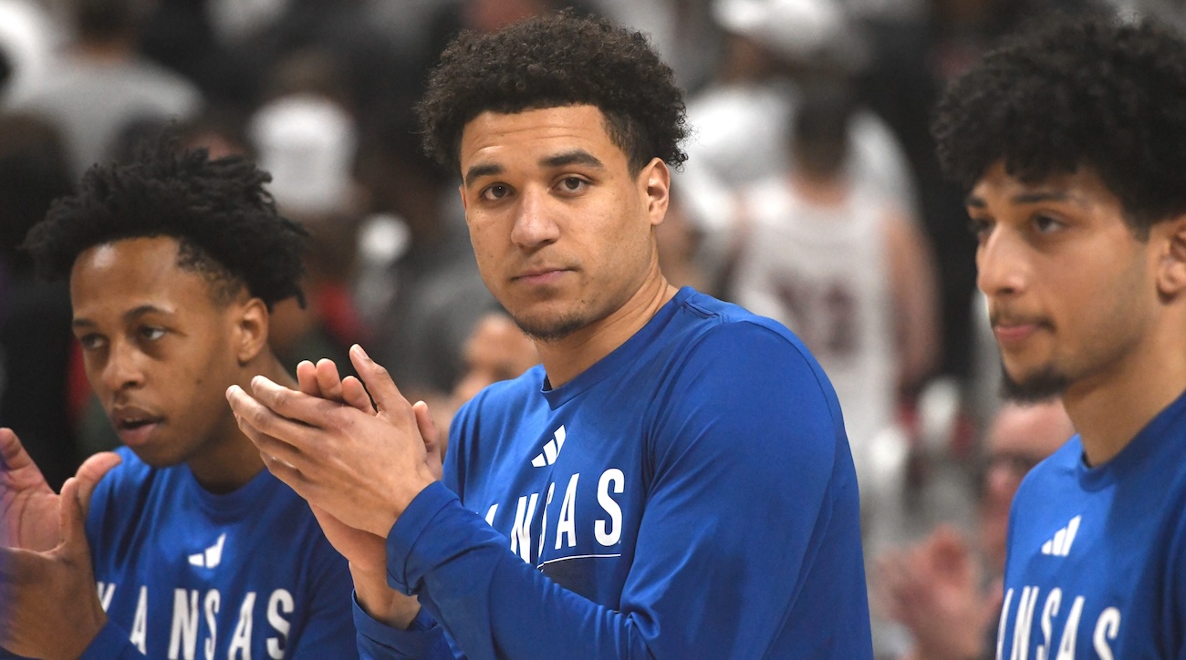 Kansas guard Kevin McCullar Jr. (15) claps during warmups before the Big 12 basketball game against Texas Tech, Monday, Feb. 12, 2024, at United Supermarkets Arena.