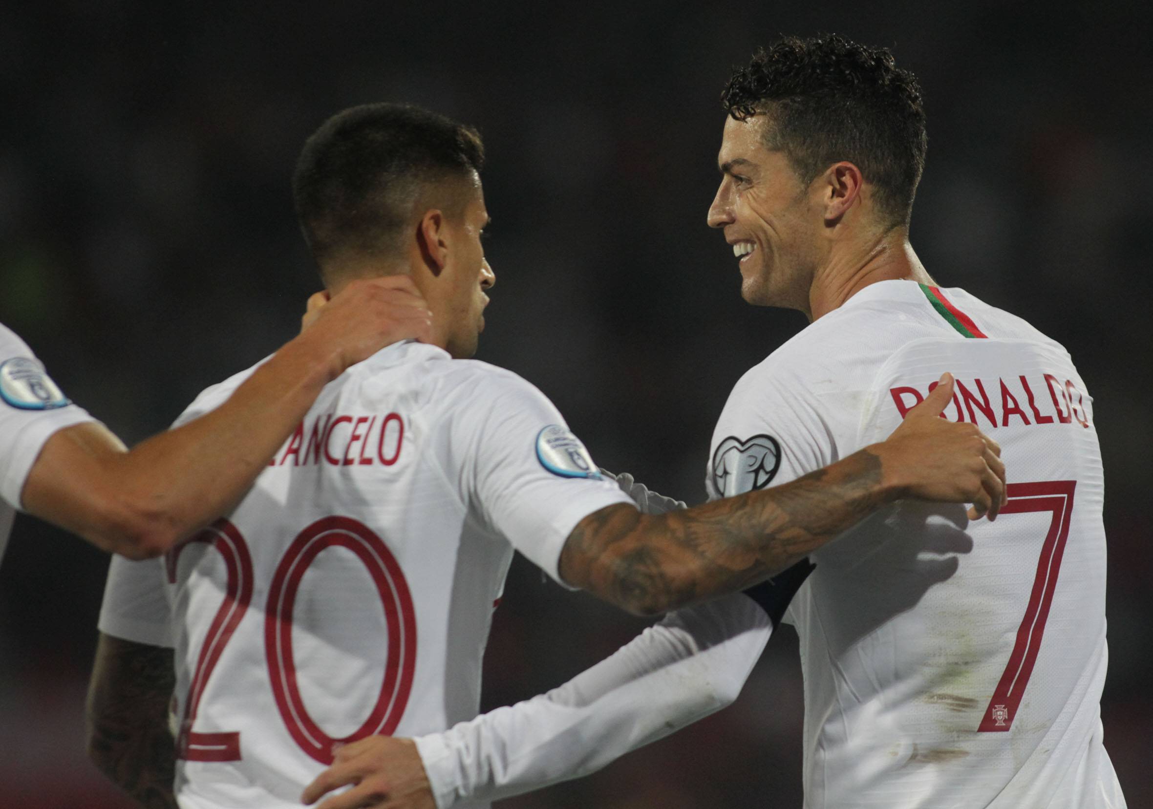 Joao Cancelo (left) and Cristiano Ronaldo pictured during Portugal's 4-2 win over Serbia in September 2019