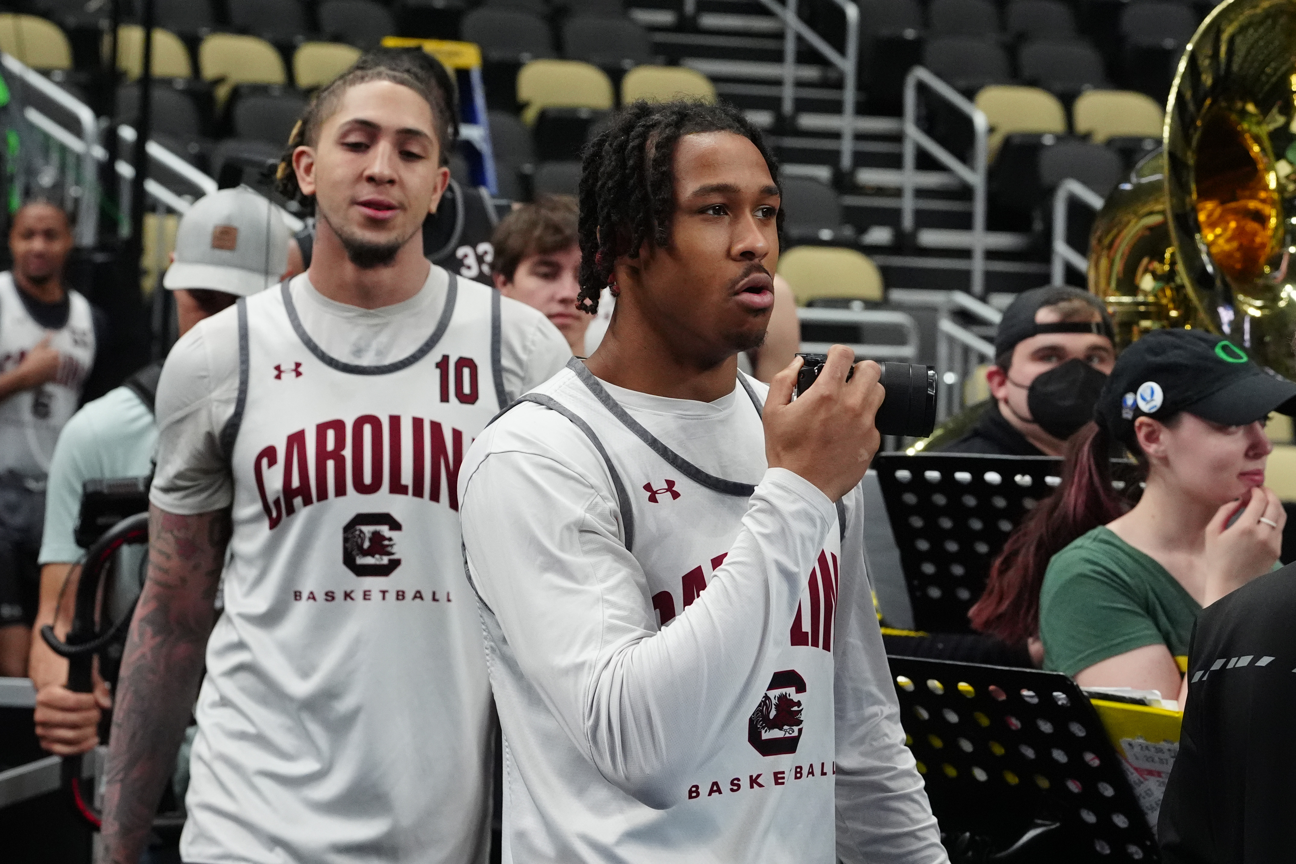 Meechie Johnson and guard Myles Stute (10) enter the court during the NCAA first round practice session at PPG Paints Arena