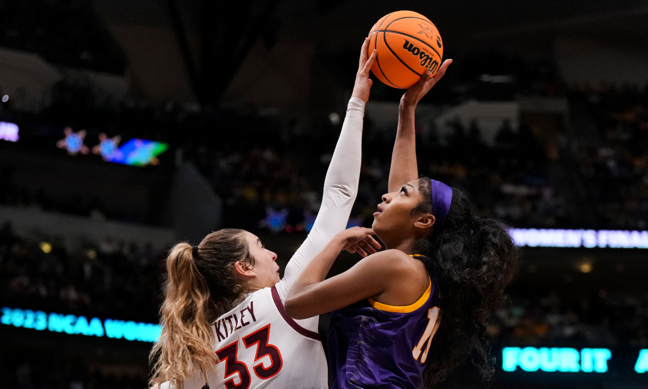 Mar 31, 2023; Dallas, TX, USA; Virginia Tech Hokies center Elizabeth Kitley (33) blocks a shot LSU Lady Tigers forward Angel Reese (10) in the second half in semifinals of the women’s Final Four of the 2023 NCAA Tournament at American Airlines Center.