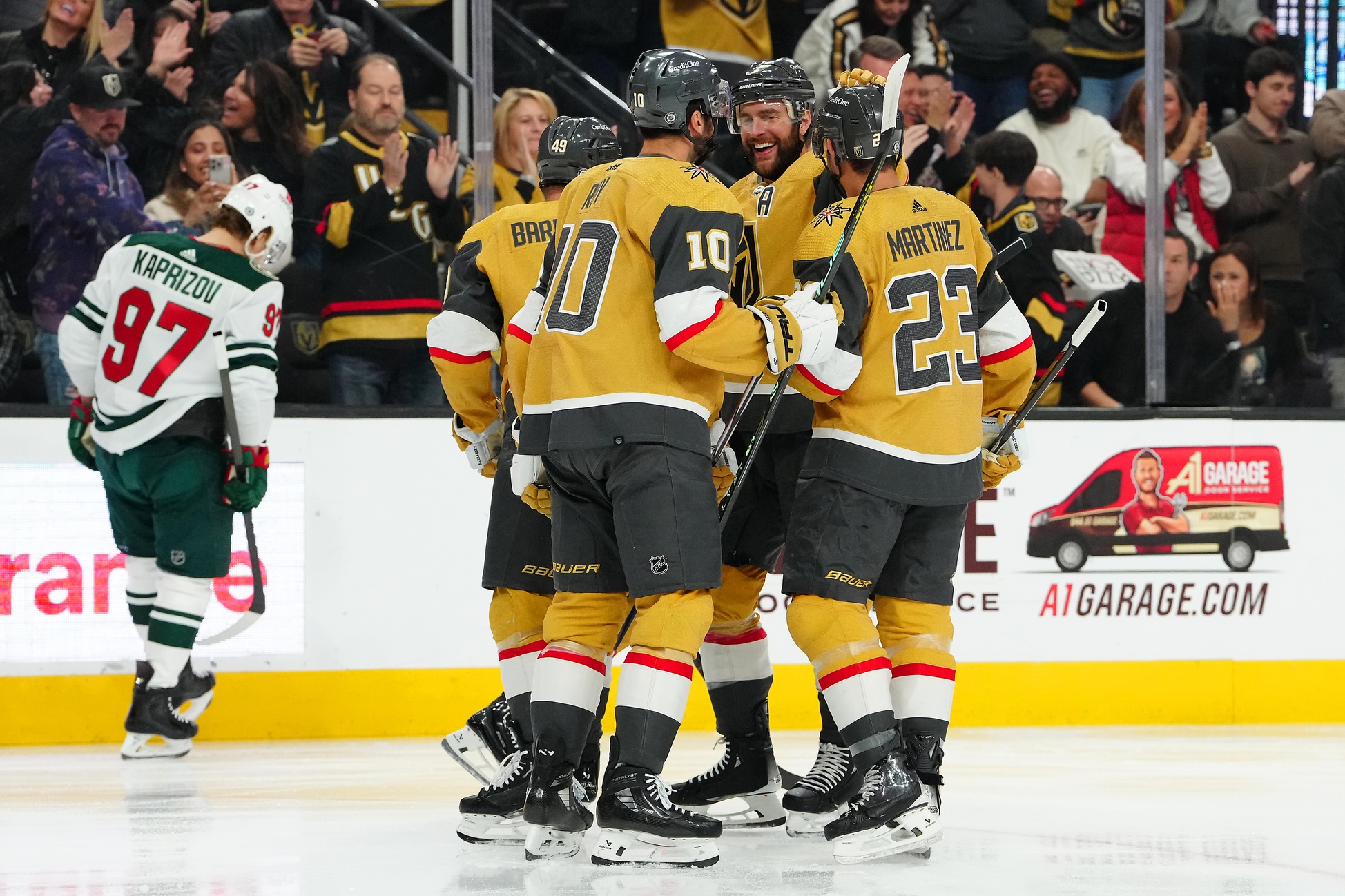 Feb 12, 2024; Las Vegas, Nevada, USA; Vegas Golden Knights right wing Jonathan Marchessault (81) celebrates with teammates after scoring a goal against the Minnesota Wild during the first period at T-Mobile Arena.